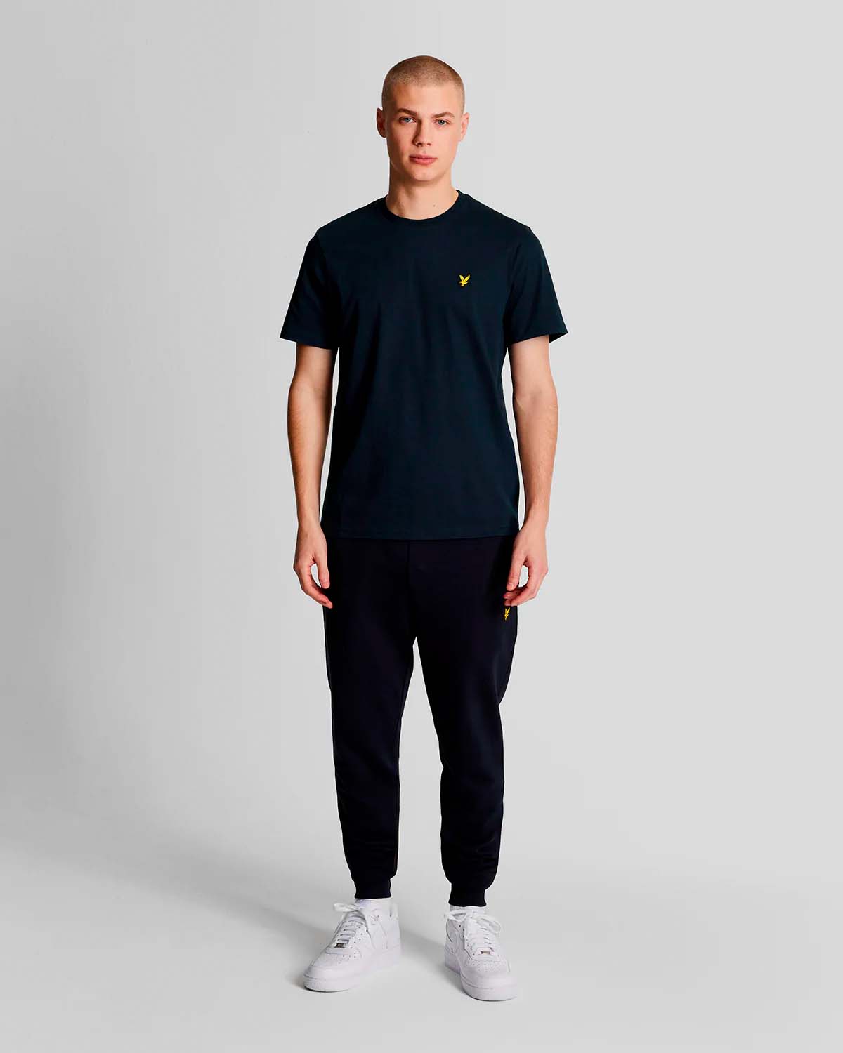 T-shirt mezza manica blu in cotone con logo aquila gialla ricamata sul petto