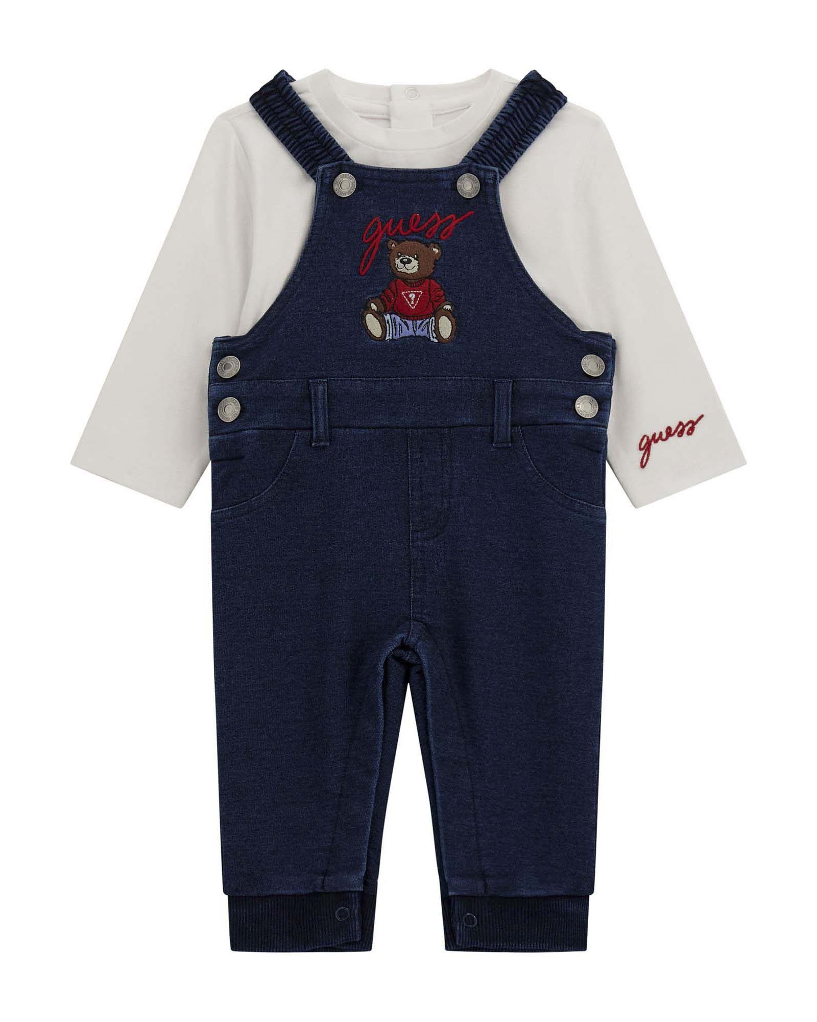 Salopette Guess in cotone stretch blu e maglia bianca a maniche lunghe