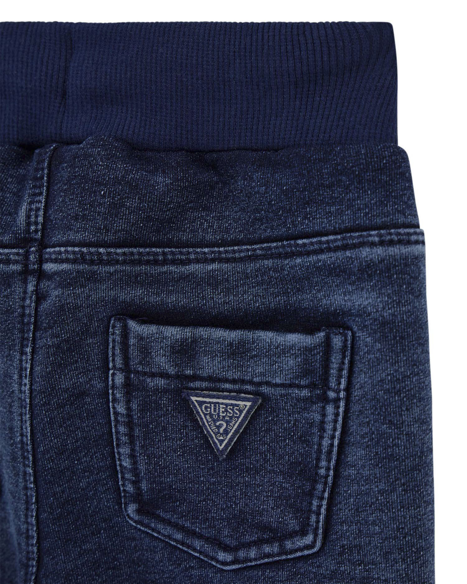 Completo Guess felpa bianca e jogger verde in puro cotone image