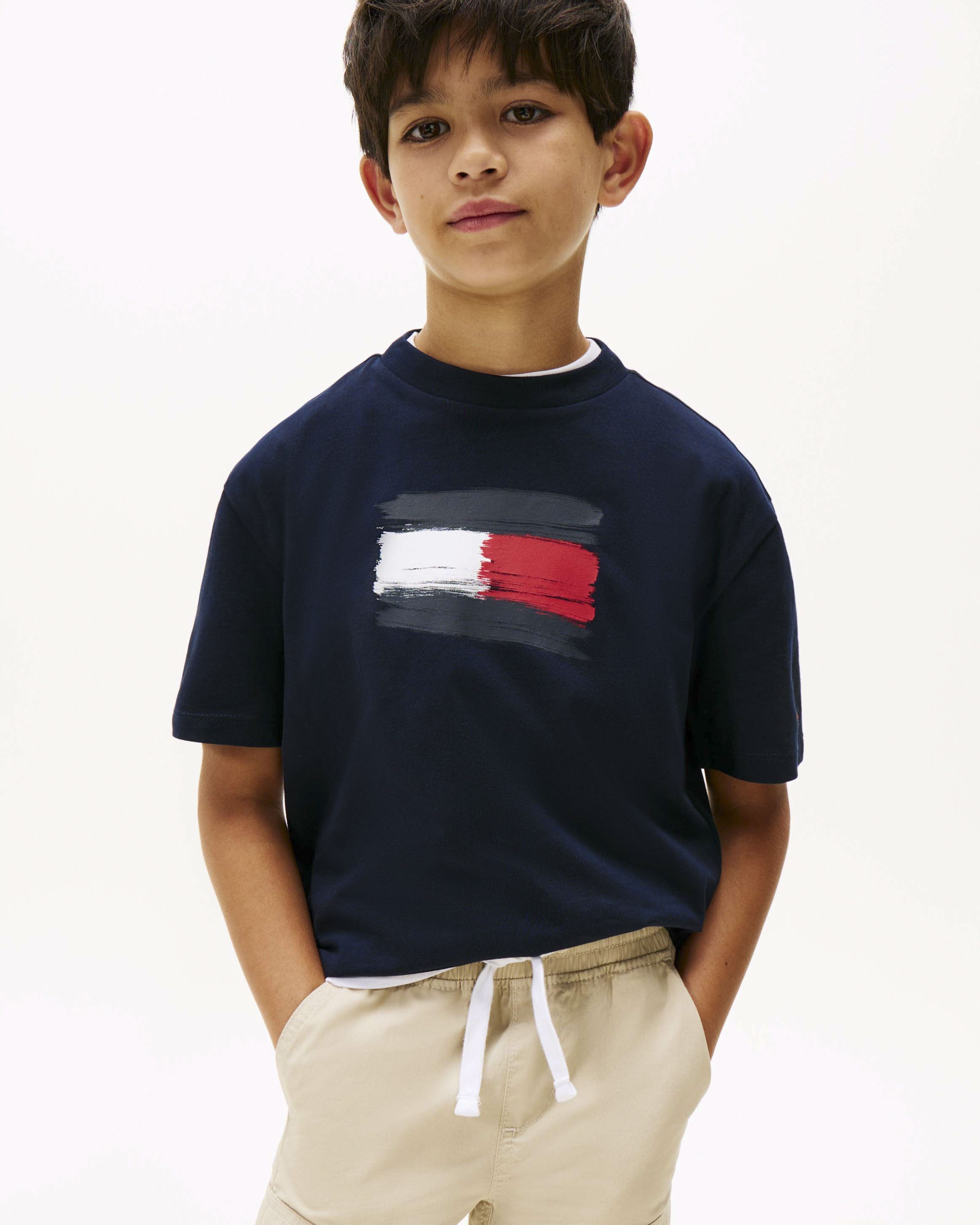 T-shirt Tommy Hilfiger blu in puro cotone con bandiera logo spennellata