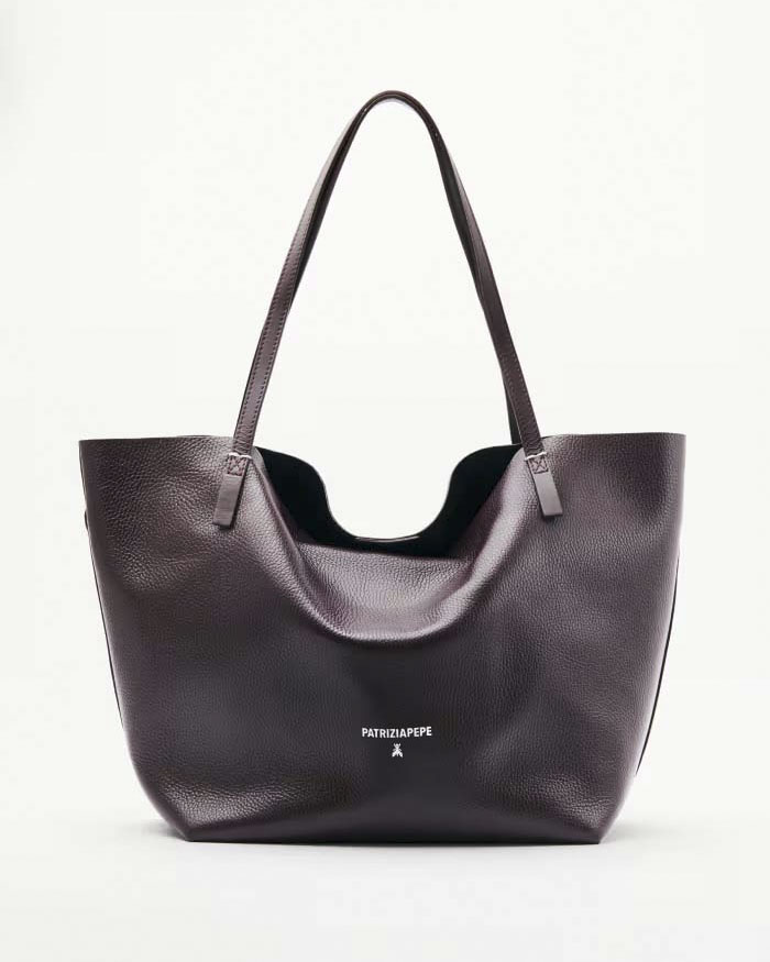 Shopping bag bordeaux linea Never Complete in pelle con scritta logo e punti di cucitura a contrasto