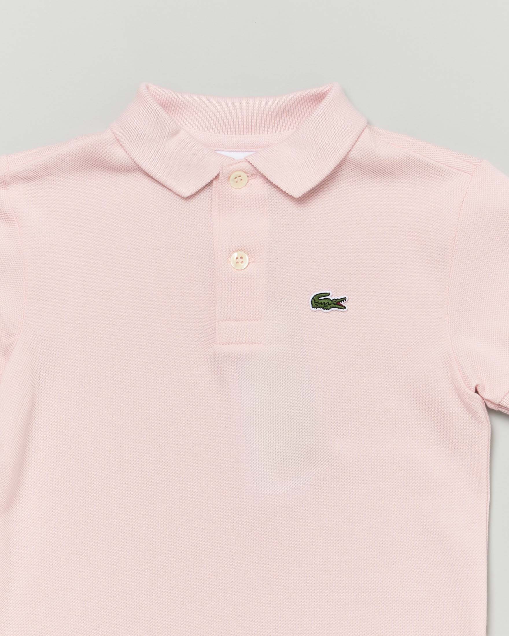Polo Lacoste rosa piqué di puro cotone image