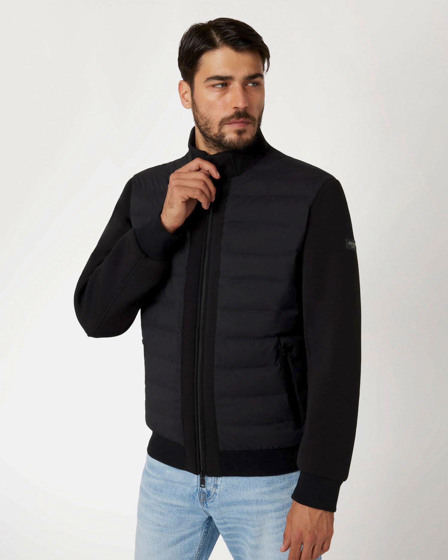 Piumino Guess nero senza cappuccio in tessuto tecnico elasticizzato image