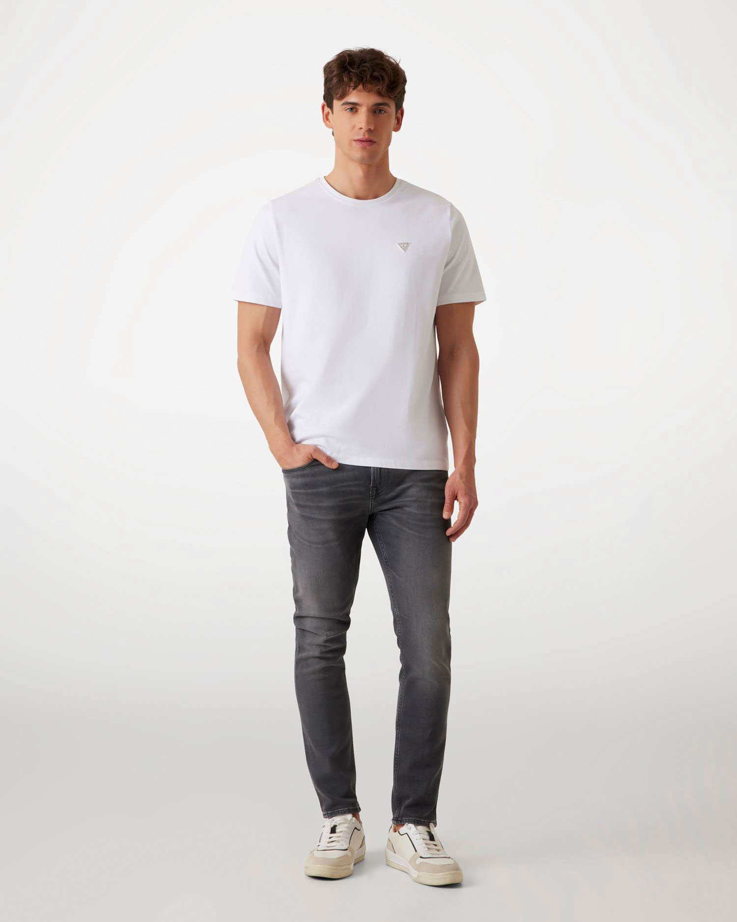 Jeans skinny Guess grigio antracite in cotone elasticizzato con baffature