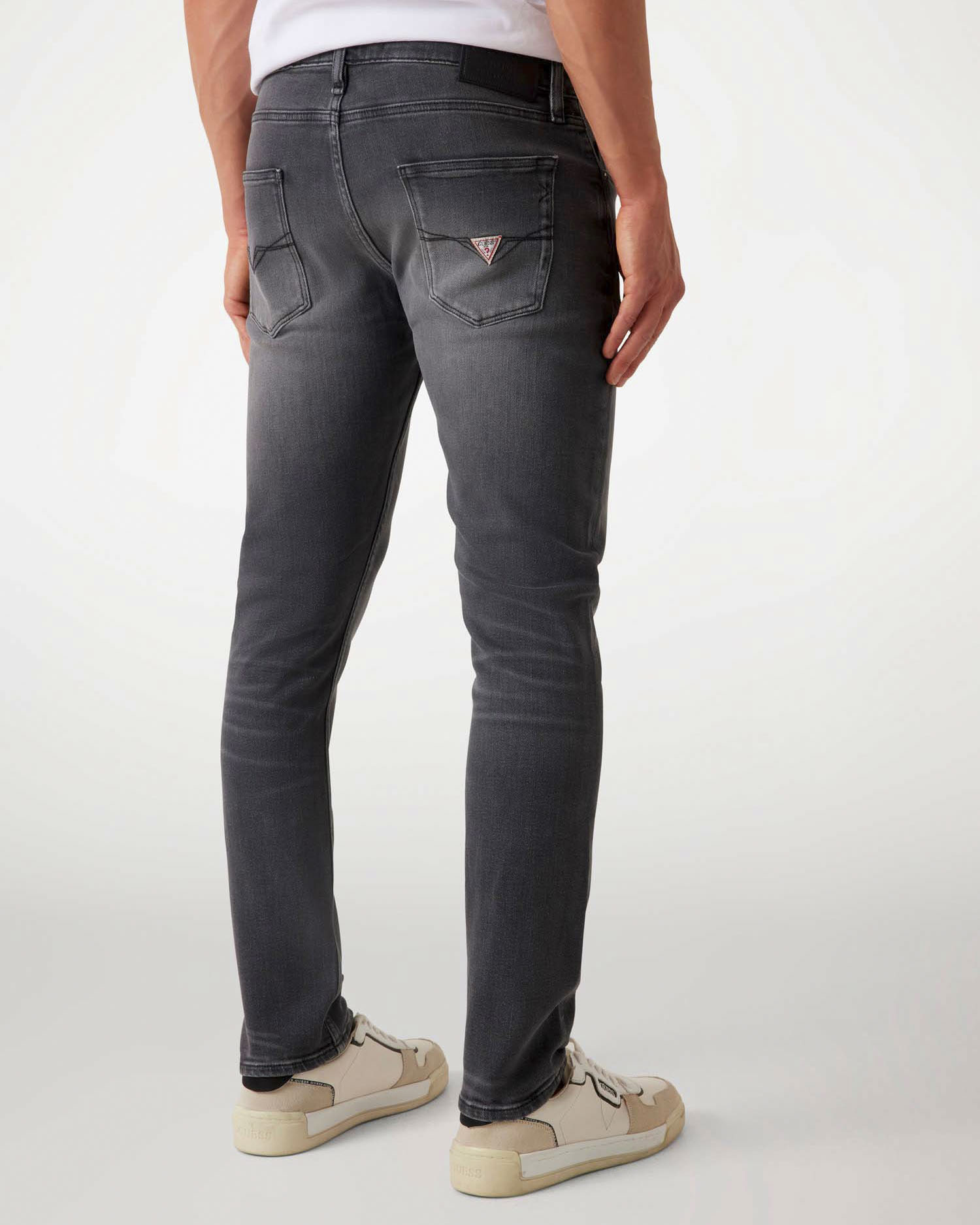 Jeans skinny Guess grigio antracite in cotone elasticizzato con baffature