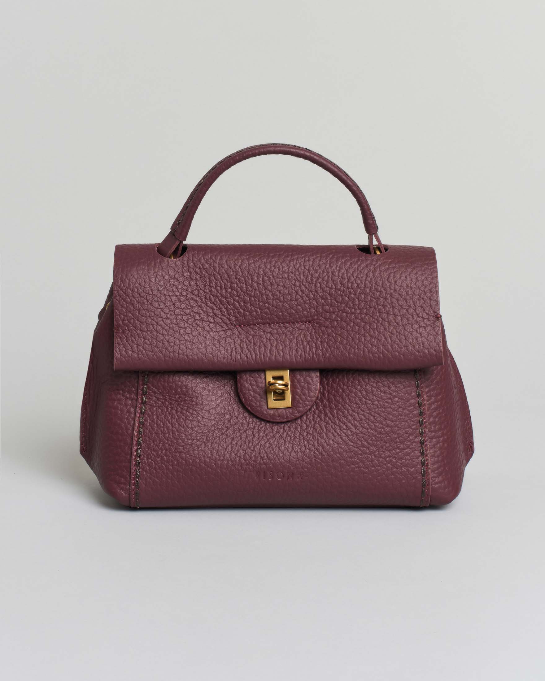 Postina piccola Visonà bordeaux in pelle martellata con chiusura a girello e tracolla più lunga