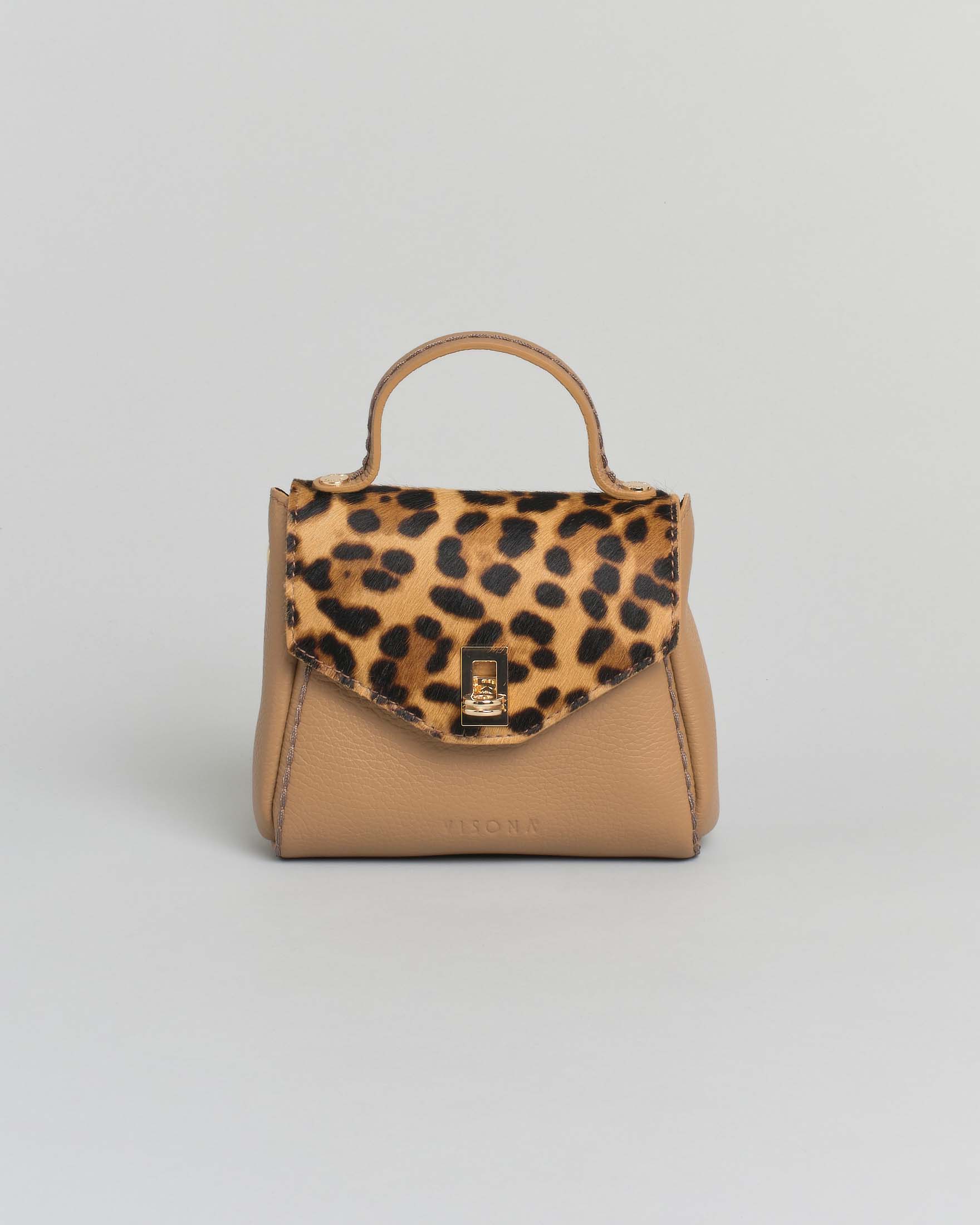 Mini bag Visonà beige in pelle martellata con impunture e patta di chiusura in cavallino effetto dalmata