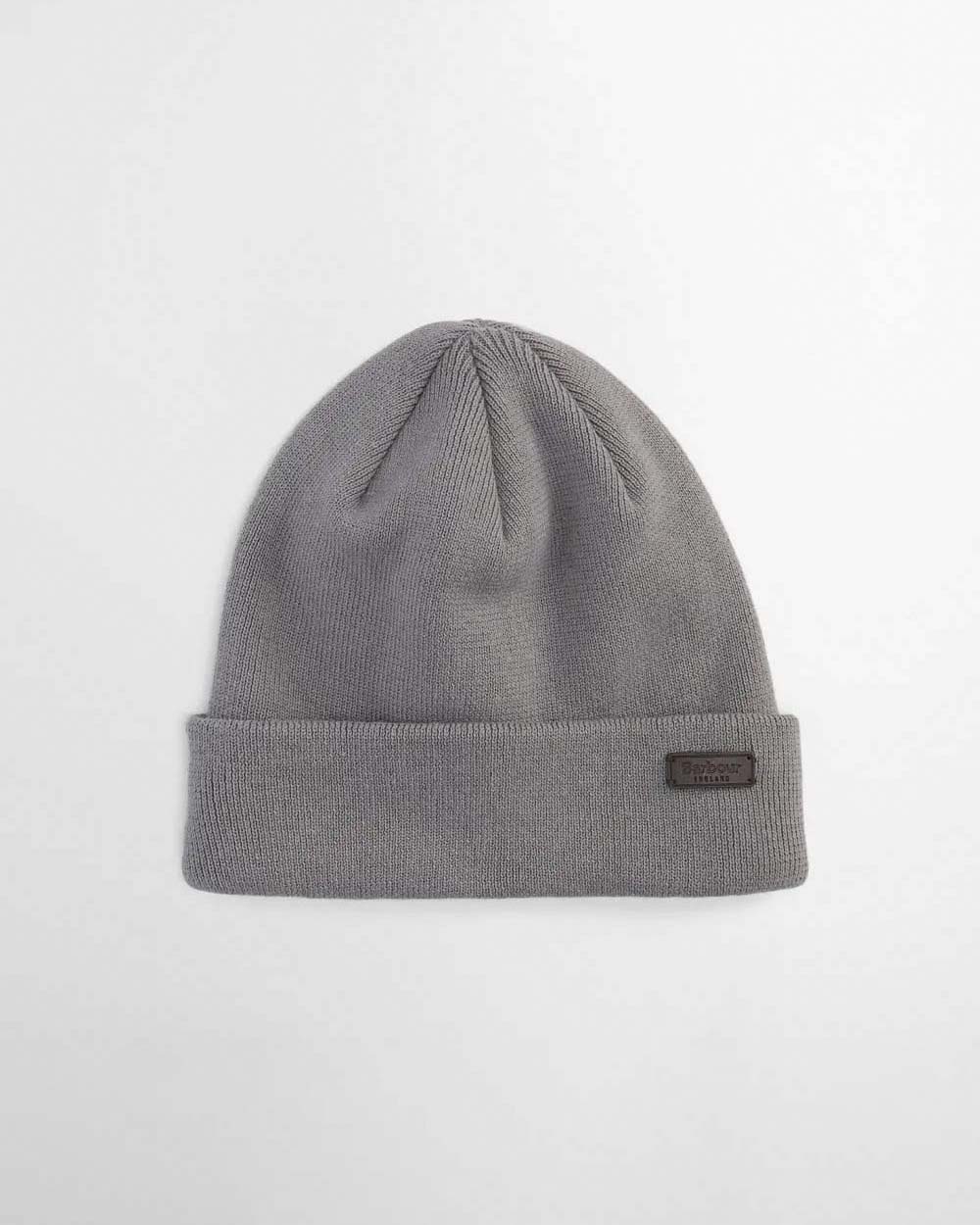 Cofanetto Barbour idea regalo composto da sciarpa tartan check marrone e blu e berretto grigio