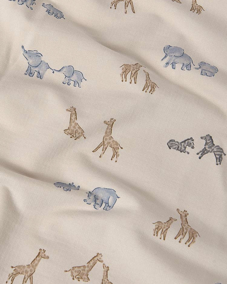 Coperta Mayoral color sabbia in misto viscosa con fantasia animaletti della savana image