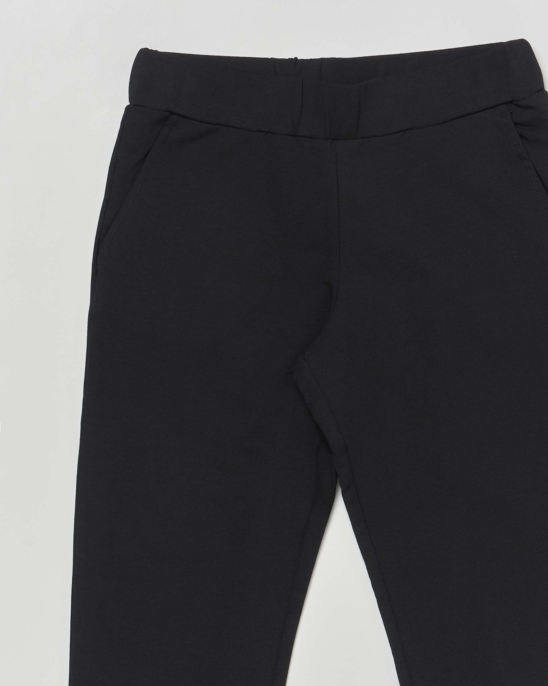 Pantalone jogger EA7 nero in cotone stretch con logo monocrom color oro image