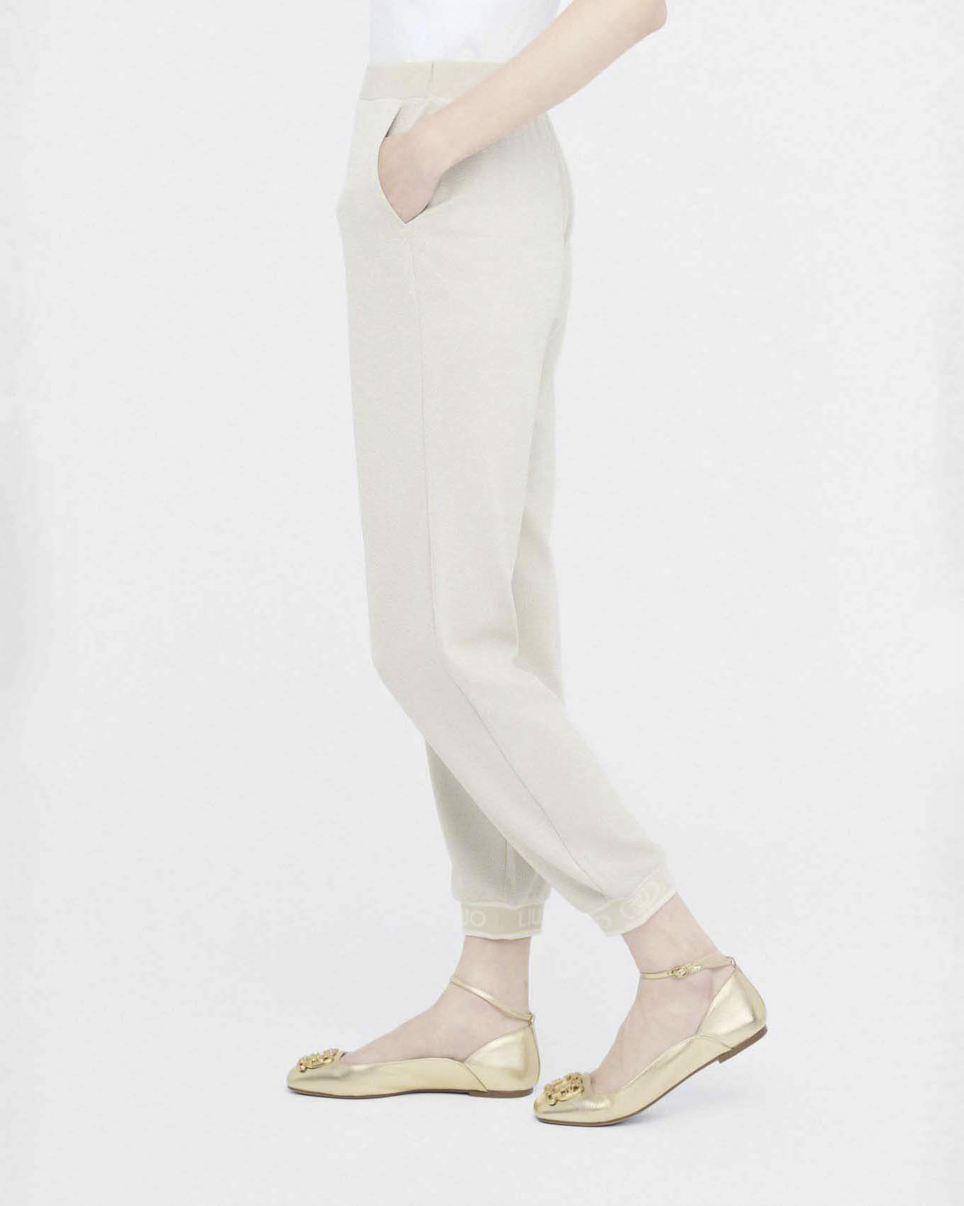 Pantaloni Liu Jo Sport oro in jersey lurex con logo in rilievo image