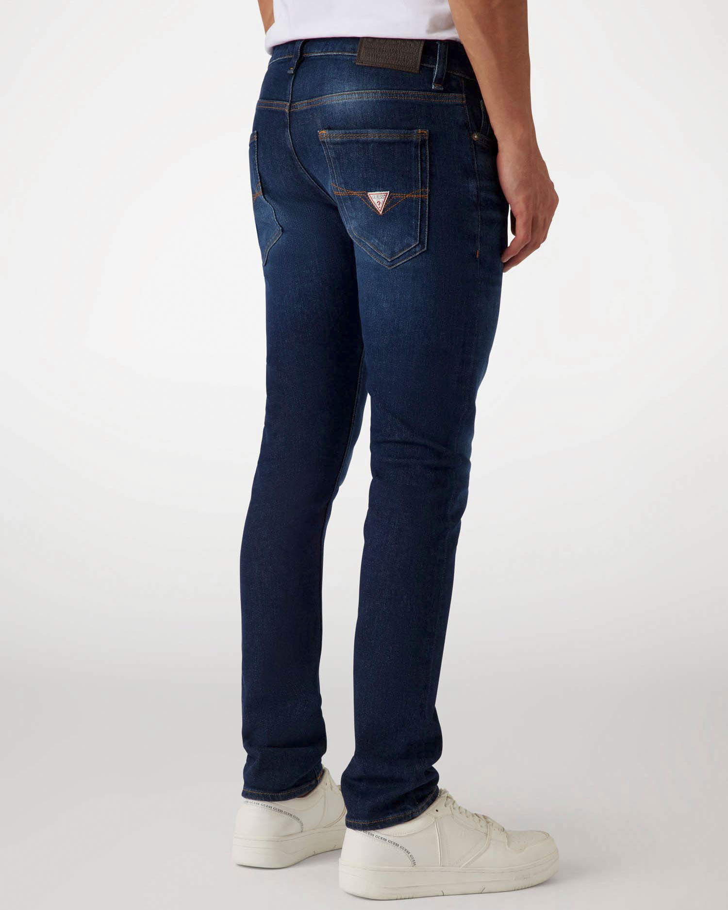 Jeans skinny Guess blu in cotone elasticizzato lavaggio scuro con baffature