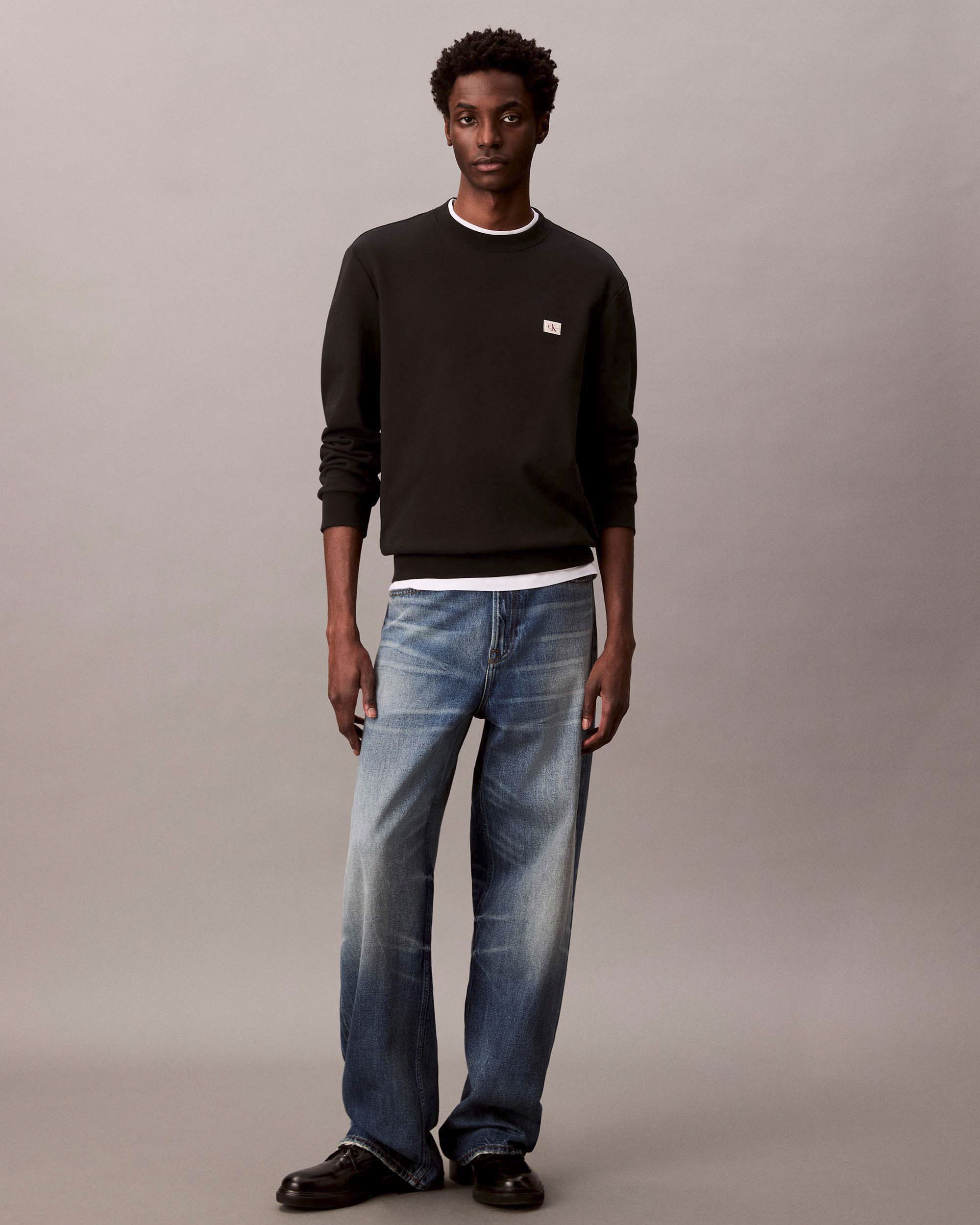 Felpa girocollo Calvin Klein Jeans nera in cotone con logo applicato sul petto