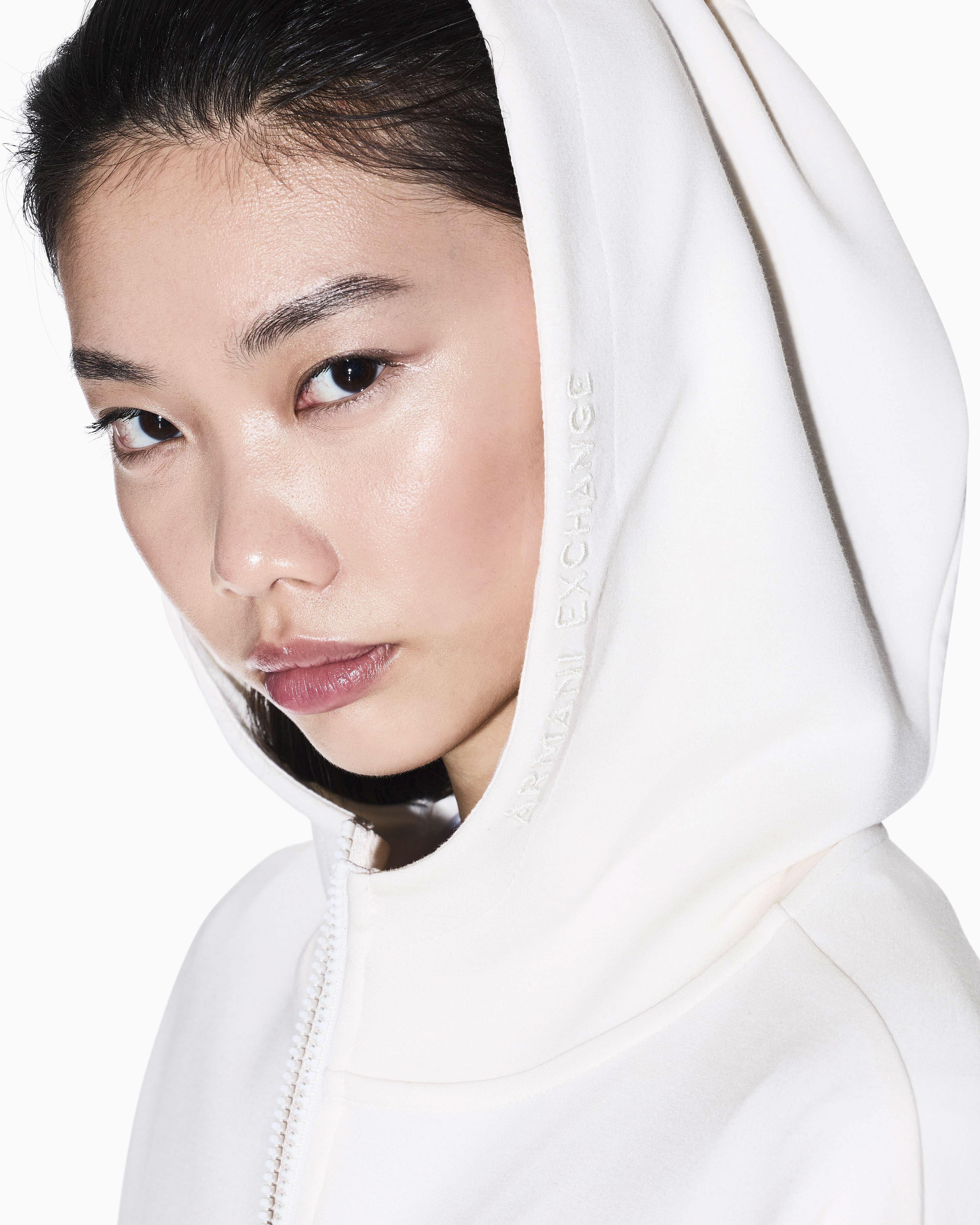 Felpa Armani Exchange bianca in misto viscosa con cappuccio e dettagli in maglia image