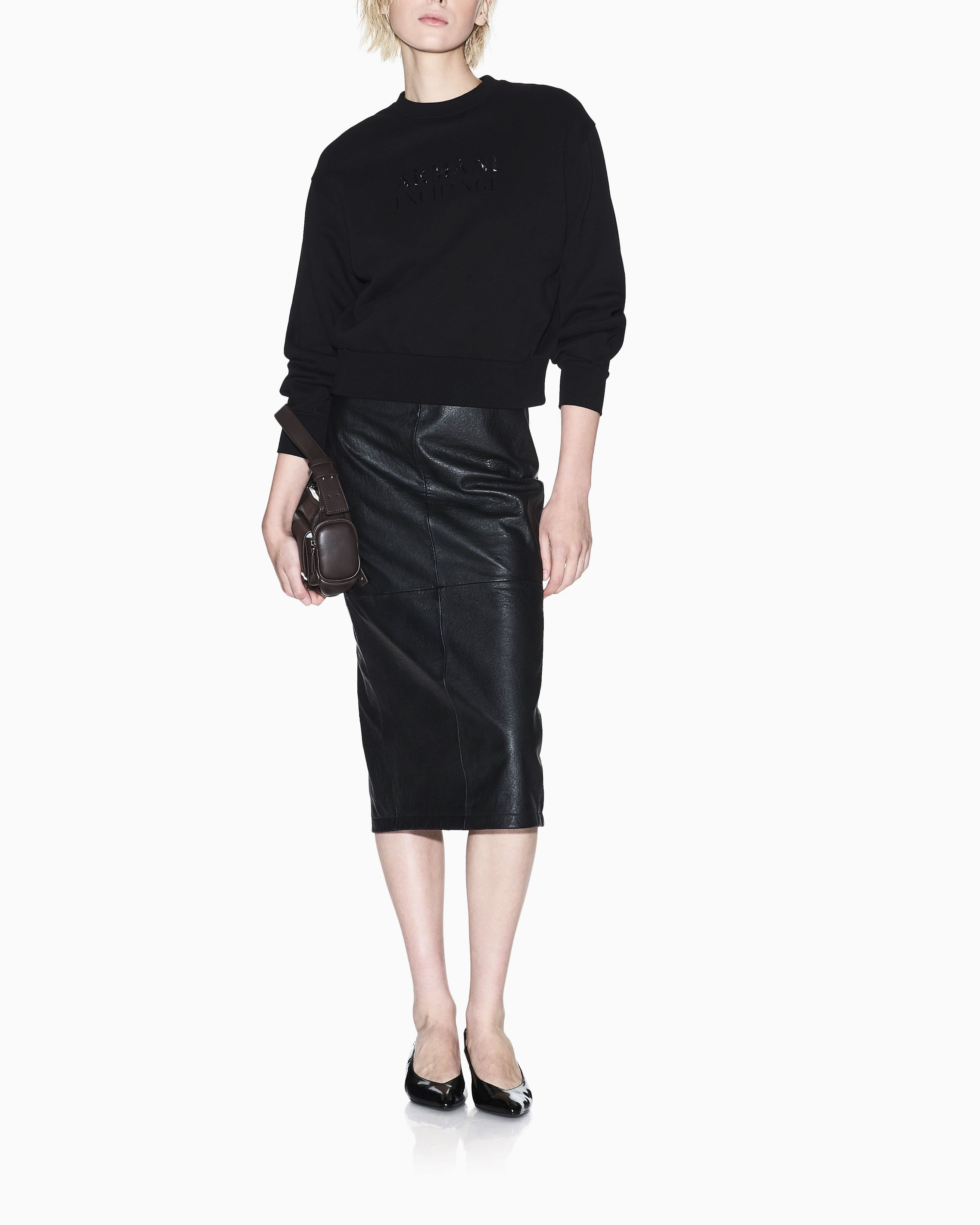 Felpa Armani Exchange nera in cotone con dettagli in maglia elasticizzata image