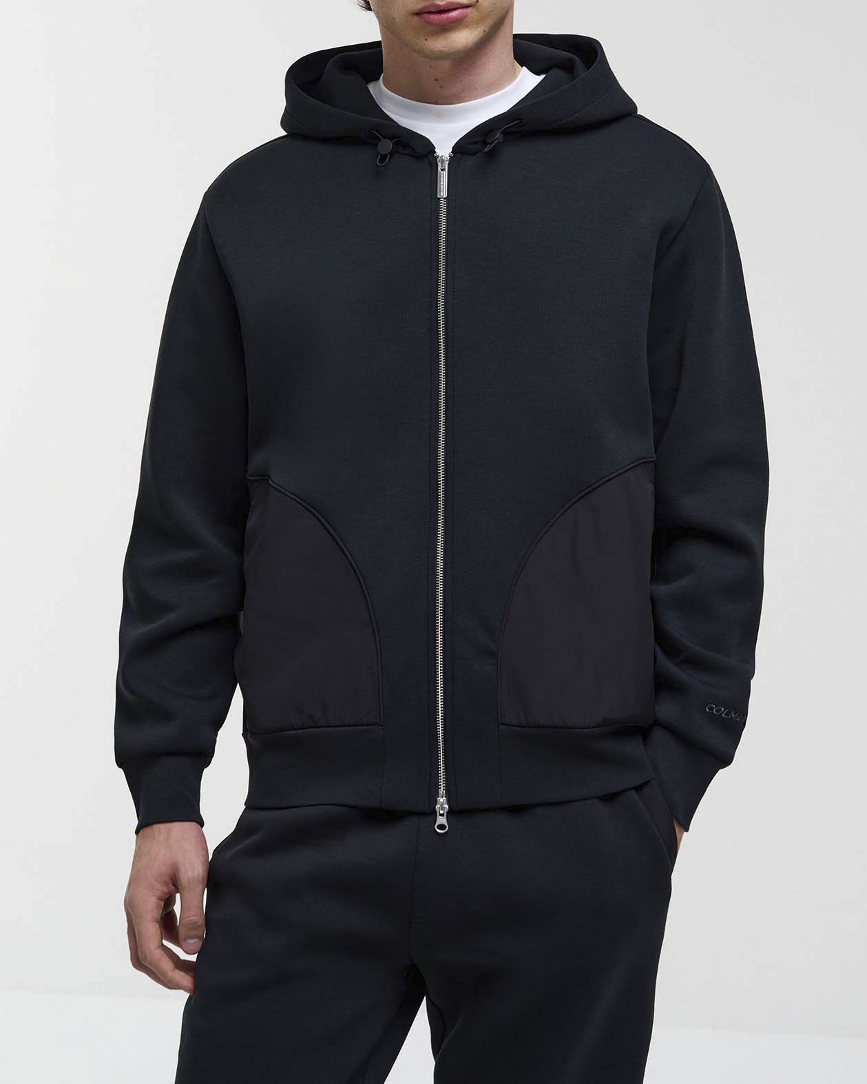 Felpa Colmar Originals nera con cappuccio chiusura zip e tasche in nylon