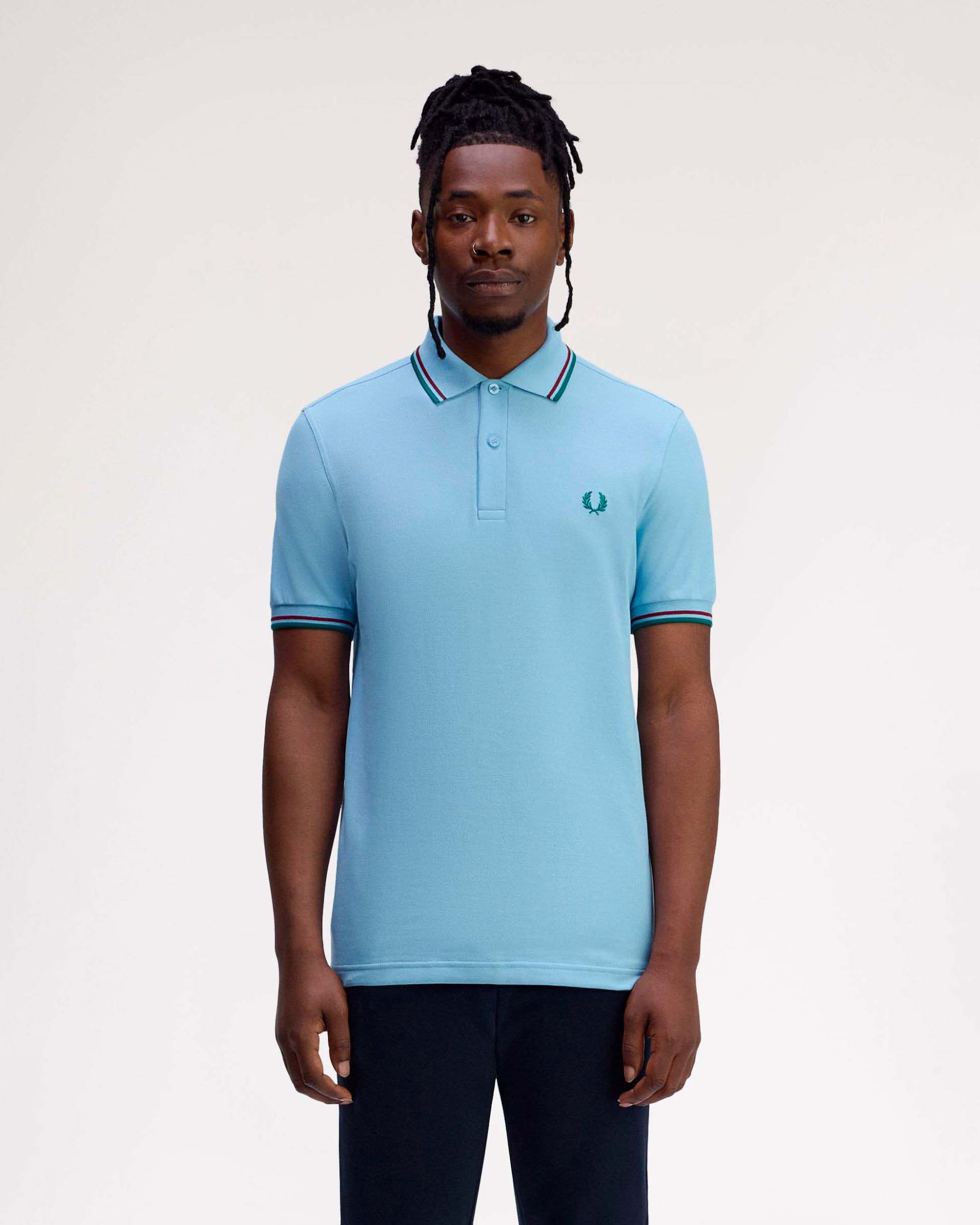 Polo Fred Perry azzurra mezza manica con bordino verde e bordeaux