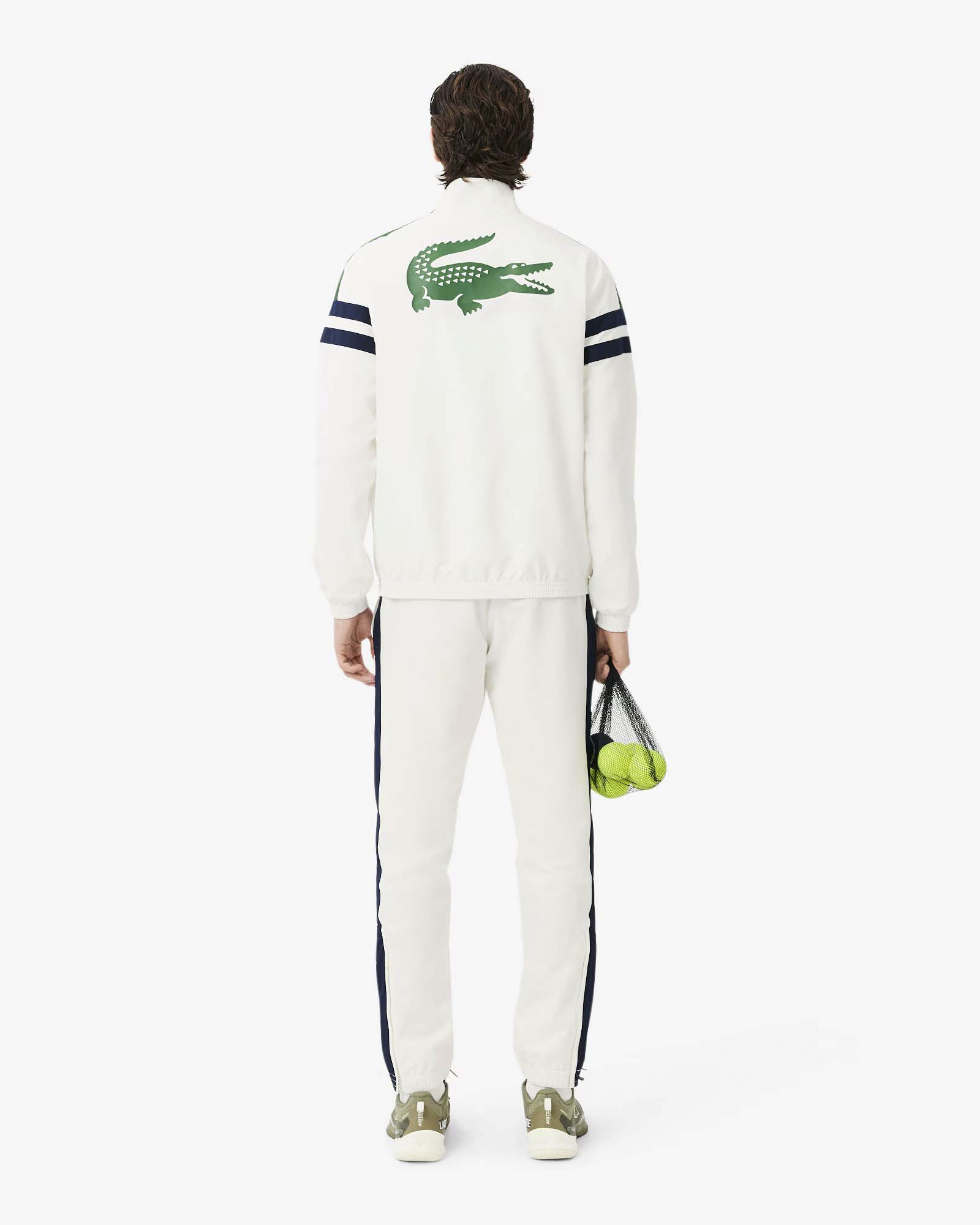 Tuta Lacoste bianca con righe blu in taffetà a rombi di poliestere riciclato image