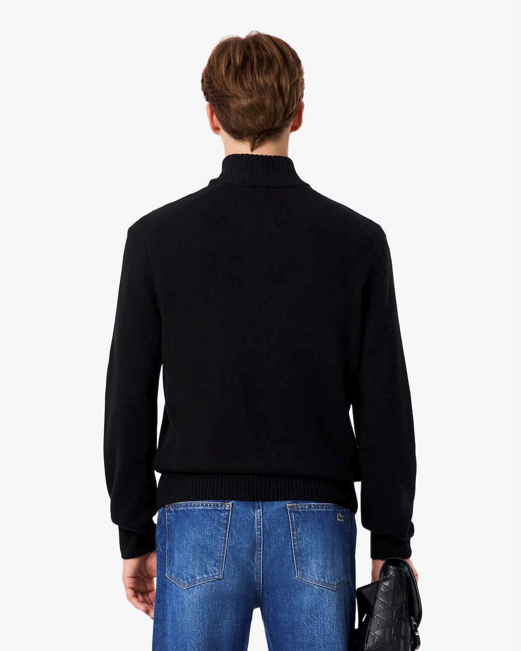 Maglia Lacoste nera in lambswool di pura lana a collo alto e apertura a mezza zip image