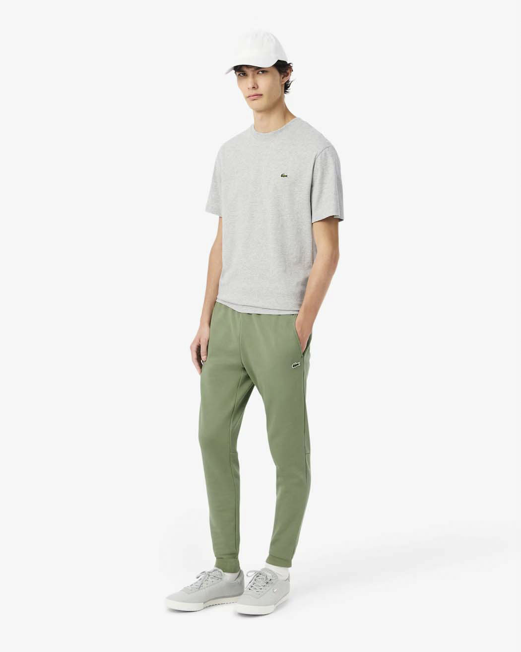 Pantaloni Lacoste verde salvia in felpa di cotone con logo coccodrillo verde sul fianco