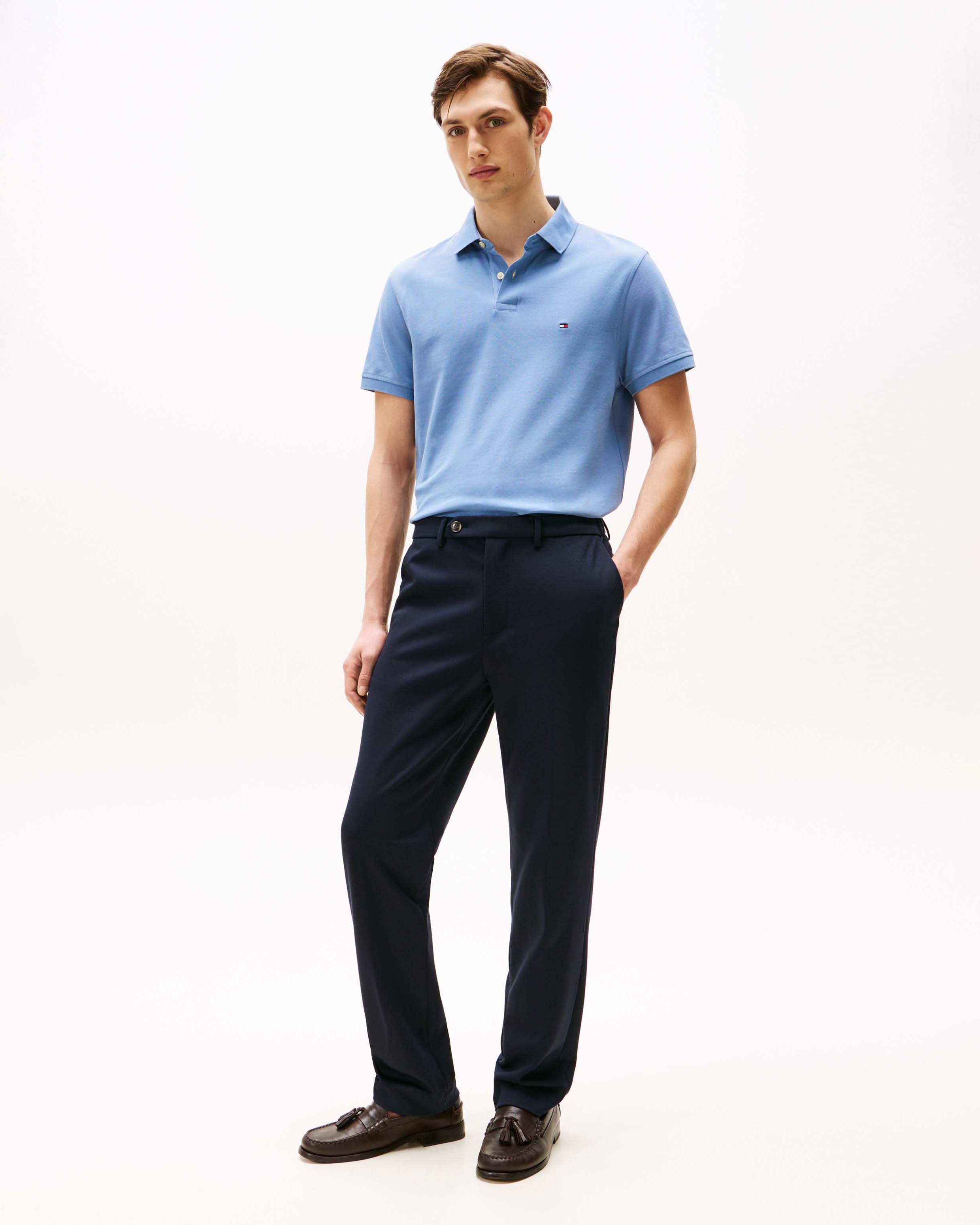 Polo mezza manica Tommy Hilfiger celeste in cotone stretch con logo flag ricamato sul petto