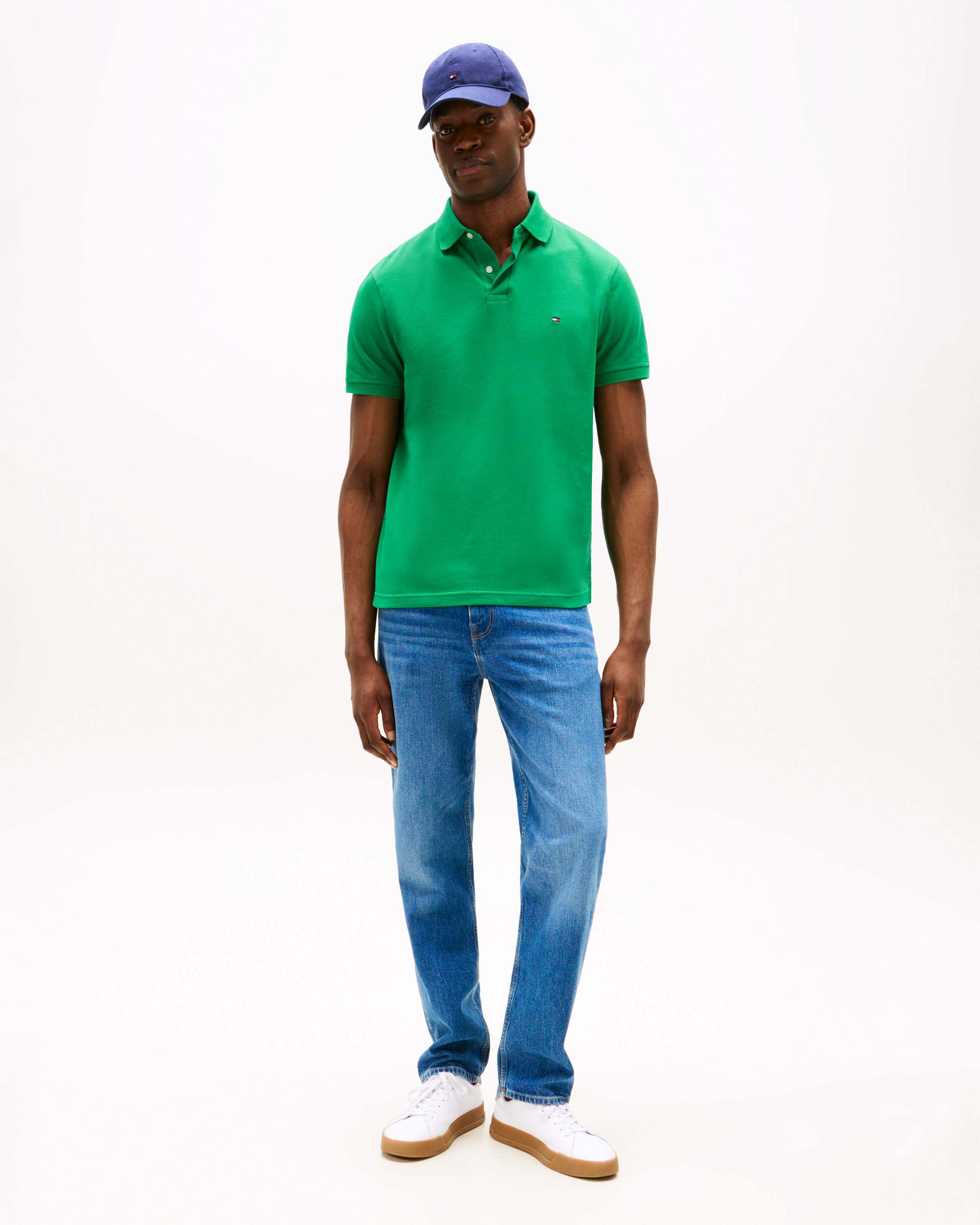 Polo mezza manica Tommy Hilfiger verde in cotone stretch con logo flag ricamato sul petto