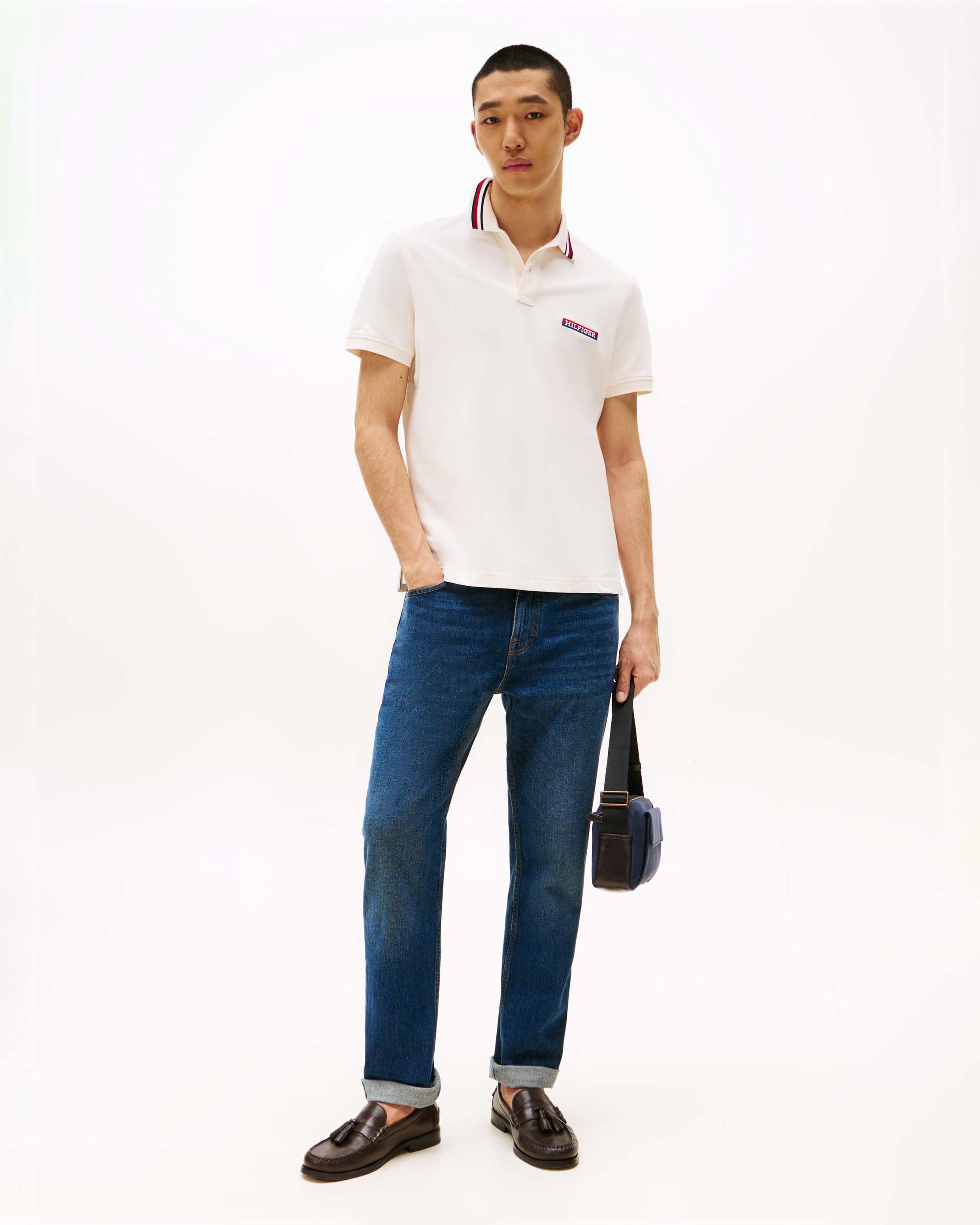 Polo Tommy Hilfiger panna in cotone stretch con logo scritta ricamata e colletto con bordino a contrasto