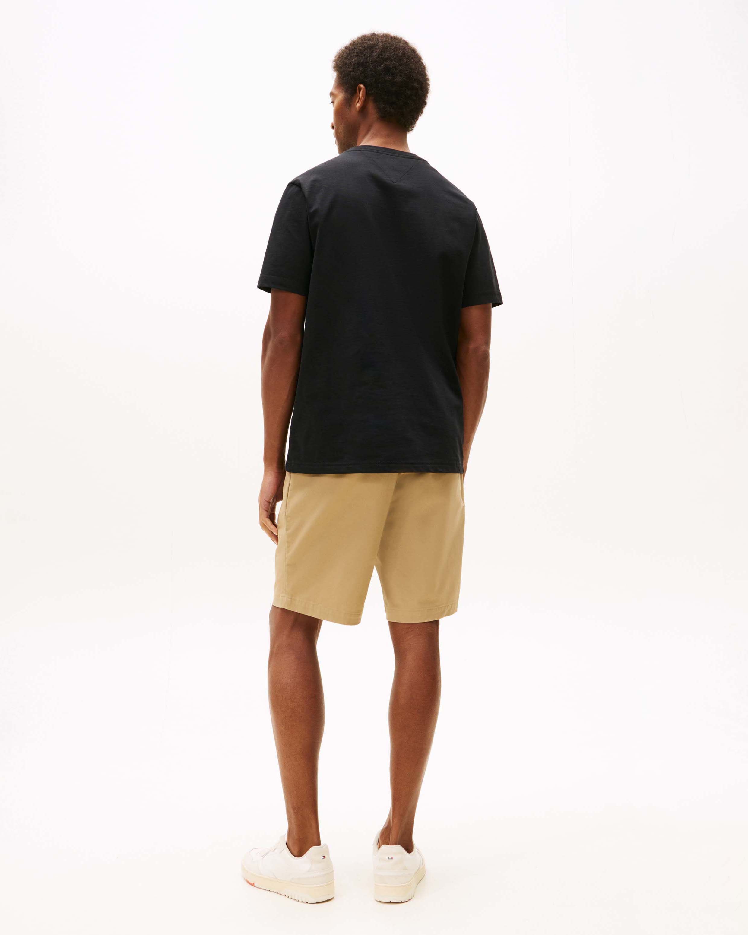 T-shirt Tommy Hilfiger nera in cotone con ricamo logo e scritta NYC sul petto image