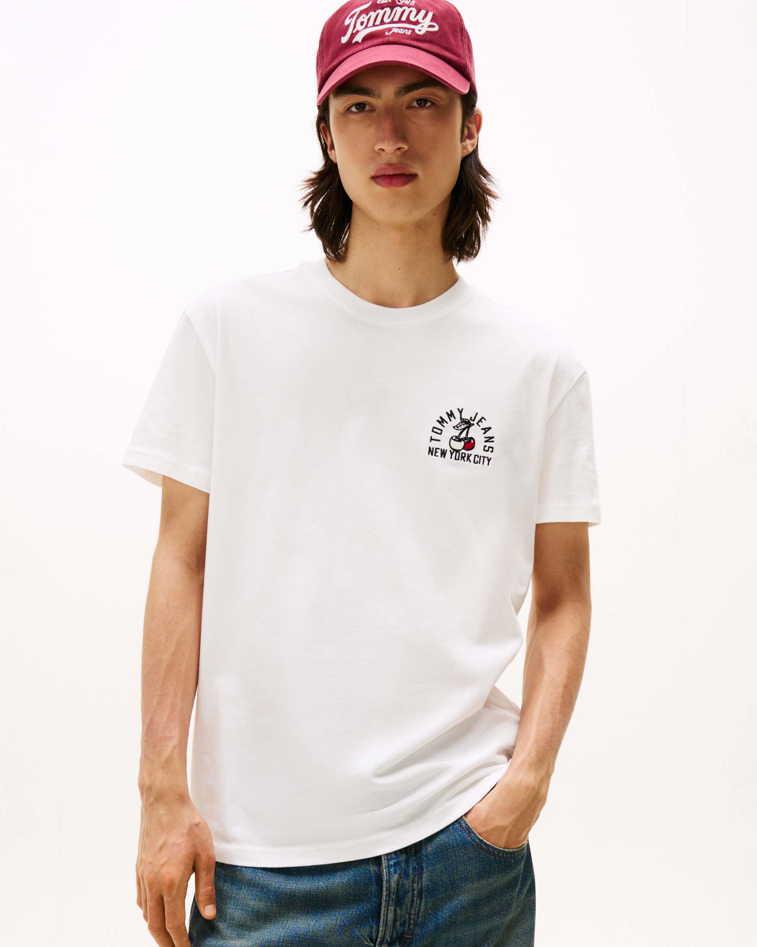 T-shirt Tommy Jeans bianca in cotone con ricamo logo sul petto