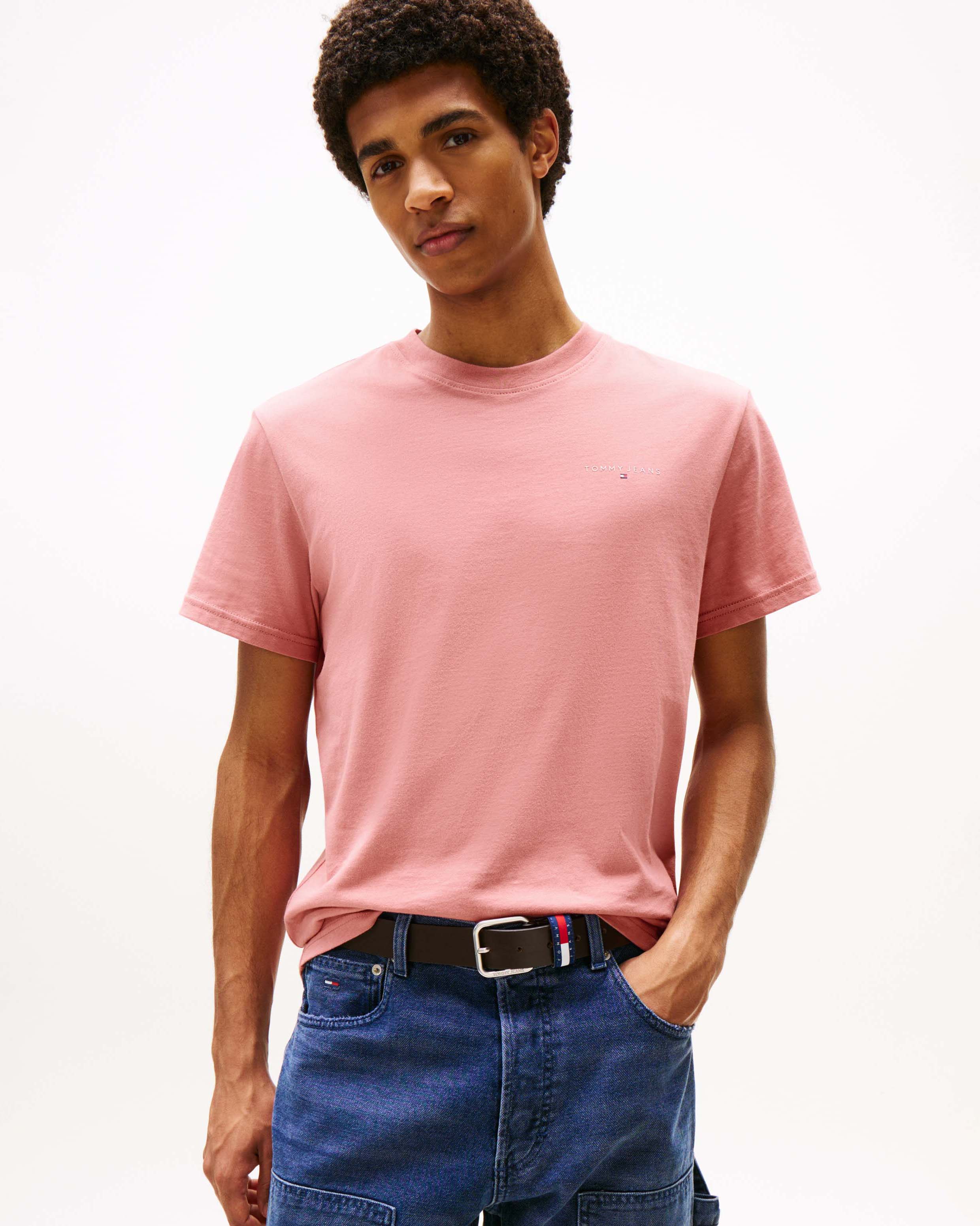T-shirt mezza manica Tommy Jeans rosa in cotone con logo piccolo stampato sul petto