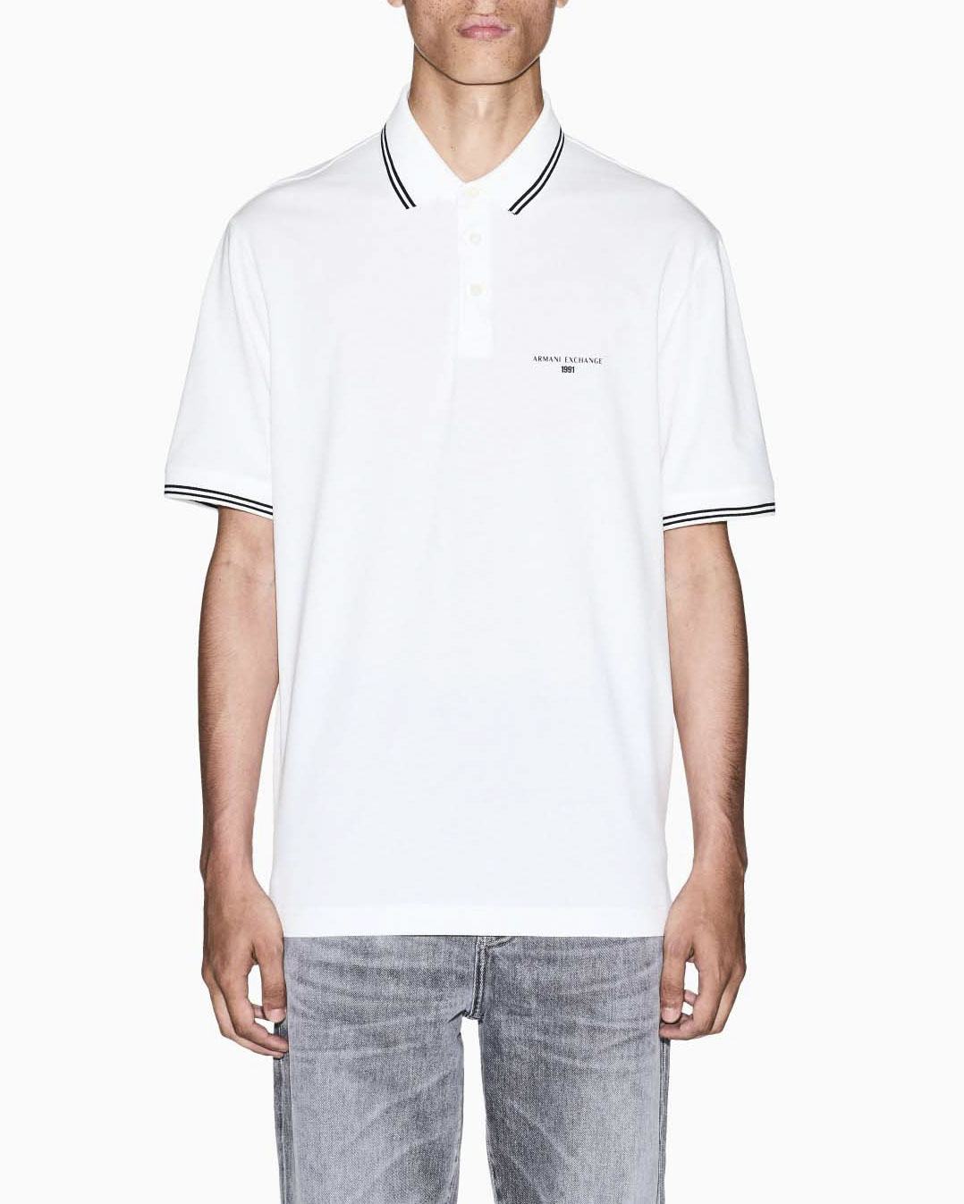 Polo mezza manica Armani Exchange bianca in cotone con logo ricamato e bordino a contrasto