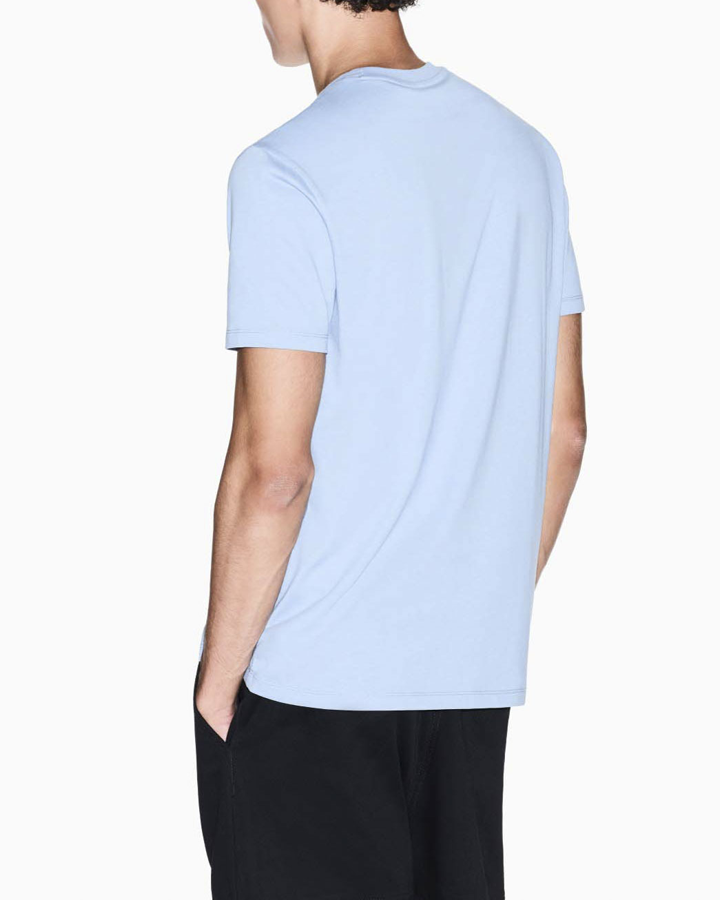 T-shirt Armani Exchange azzurra in cotone con logo ricamato tono su tono image