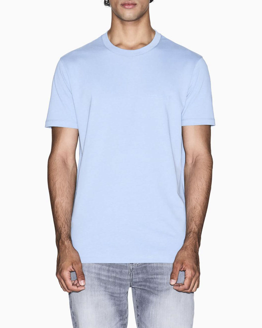 T-shirt Armani Exchange azzurra in cotone con piccolo logo stampato sul petto in tono