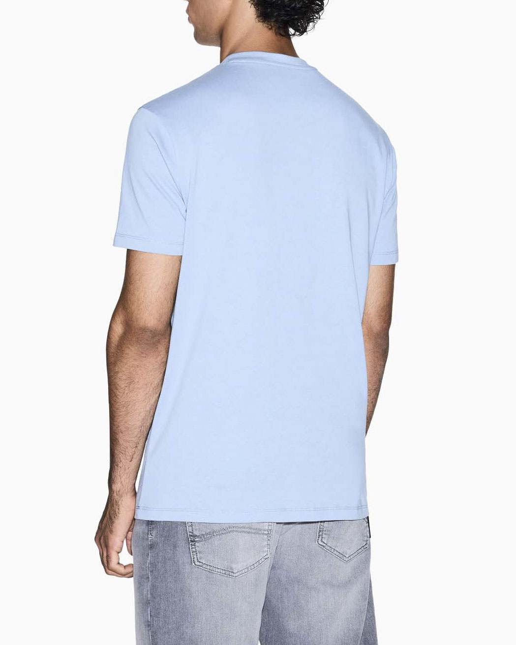 T-shirt Armani Exchange azzurra in cotone con piccolo logo stampato sul petto in tono image