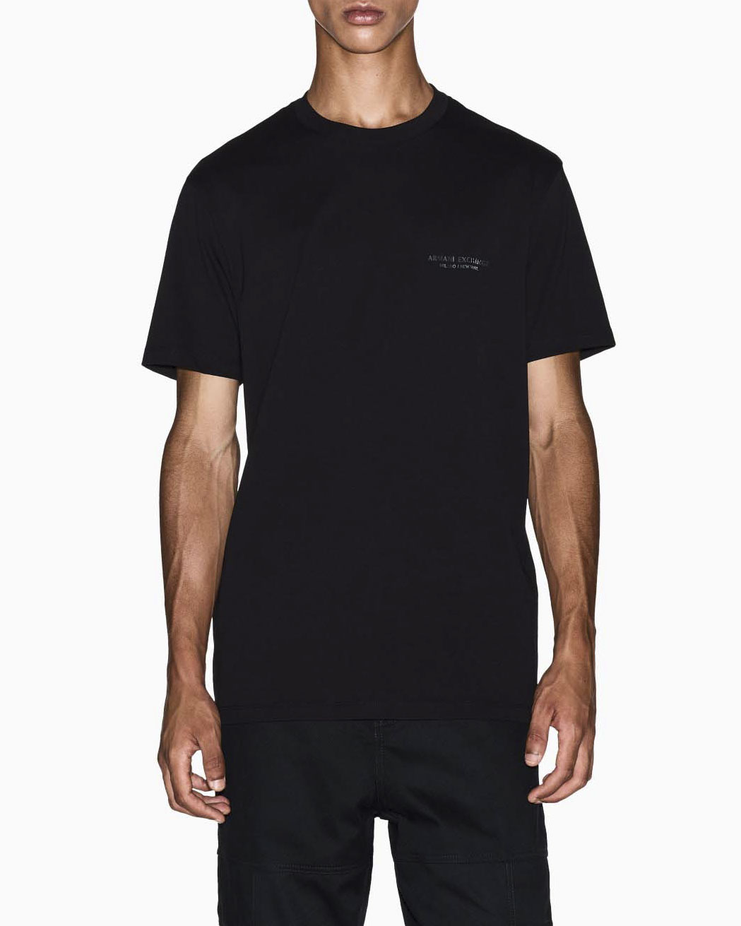 T-shirt Exchange nera in cotone con piccolo logo stampato sul petto in tono