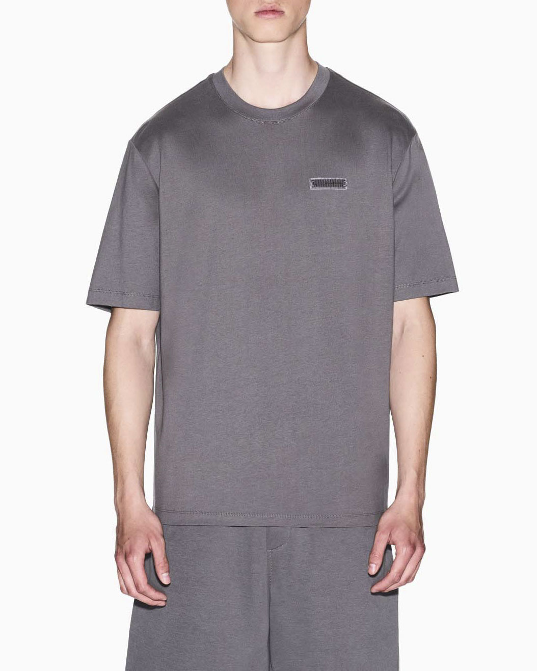 T-shirt Exchange fango in cotone con patch logo piccolo sul petto e maxi sul retro