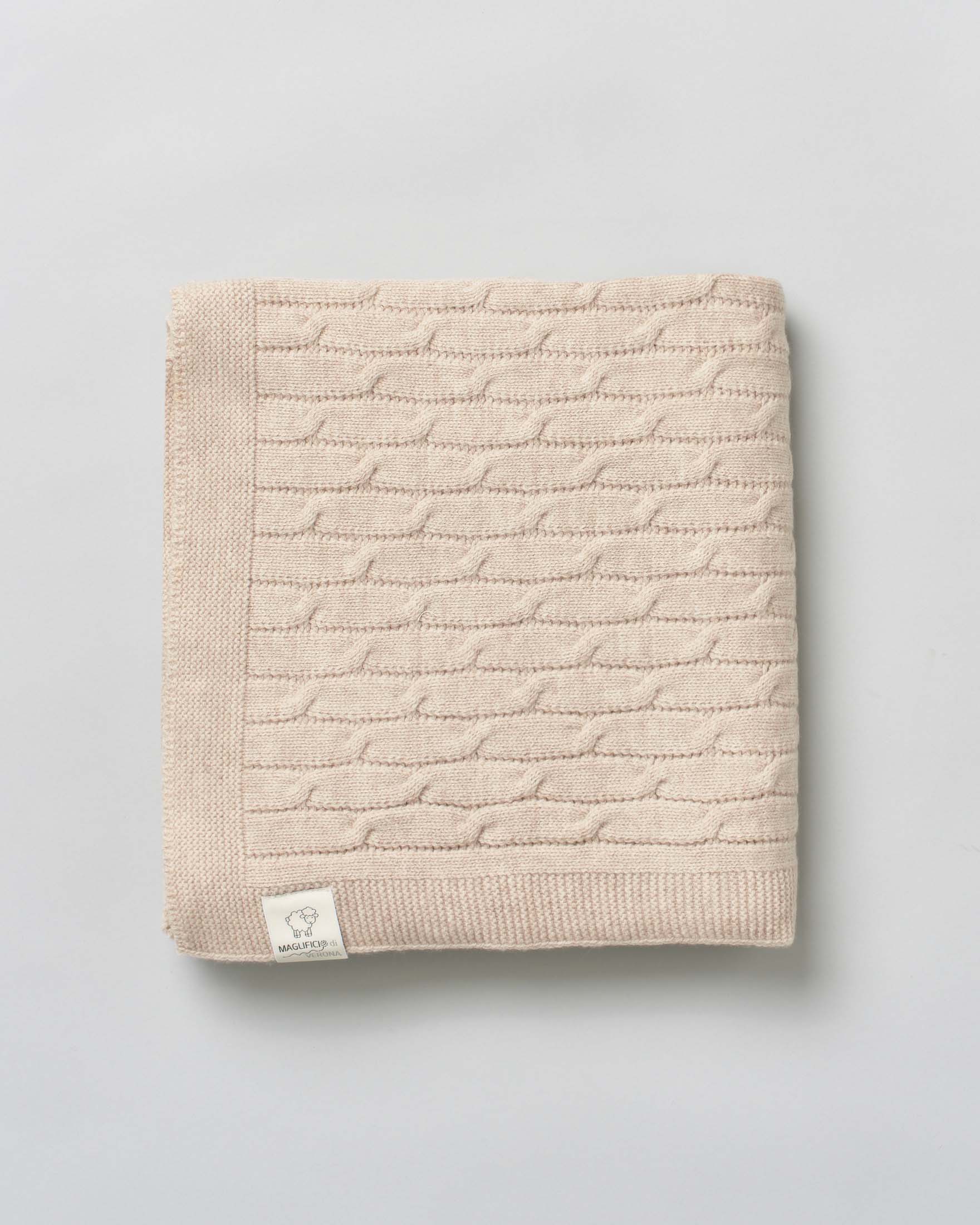Coperta beige in pura lana merinos lavorata a trecce