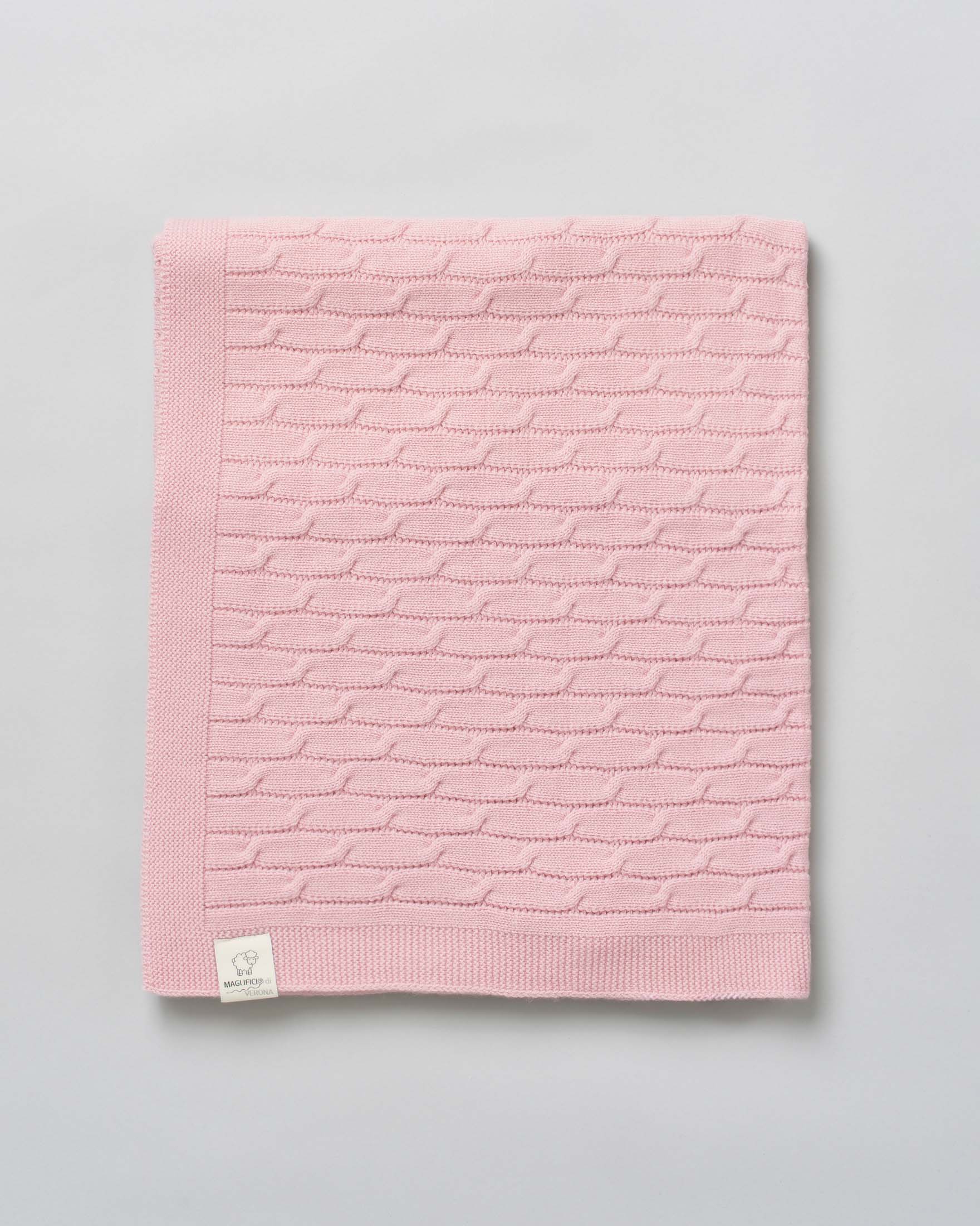 Coperta Maglificio di Verona rosa in pura lana merinos lavorata a trecce