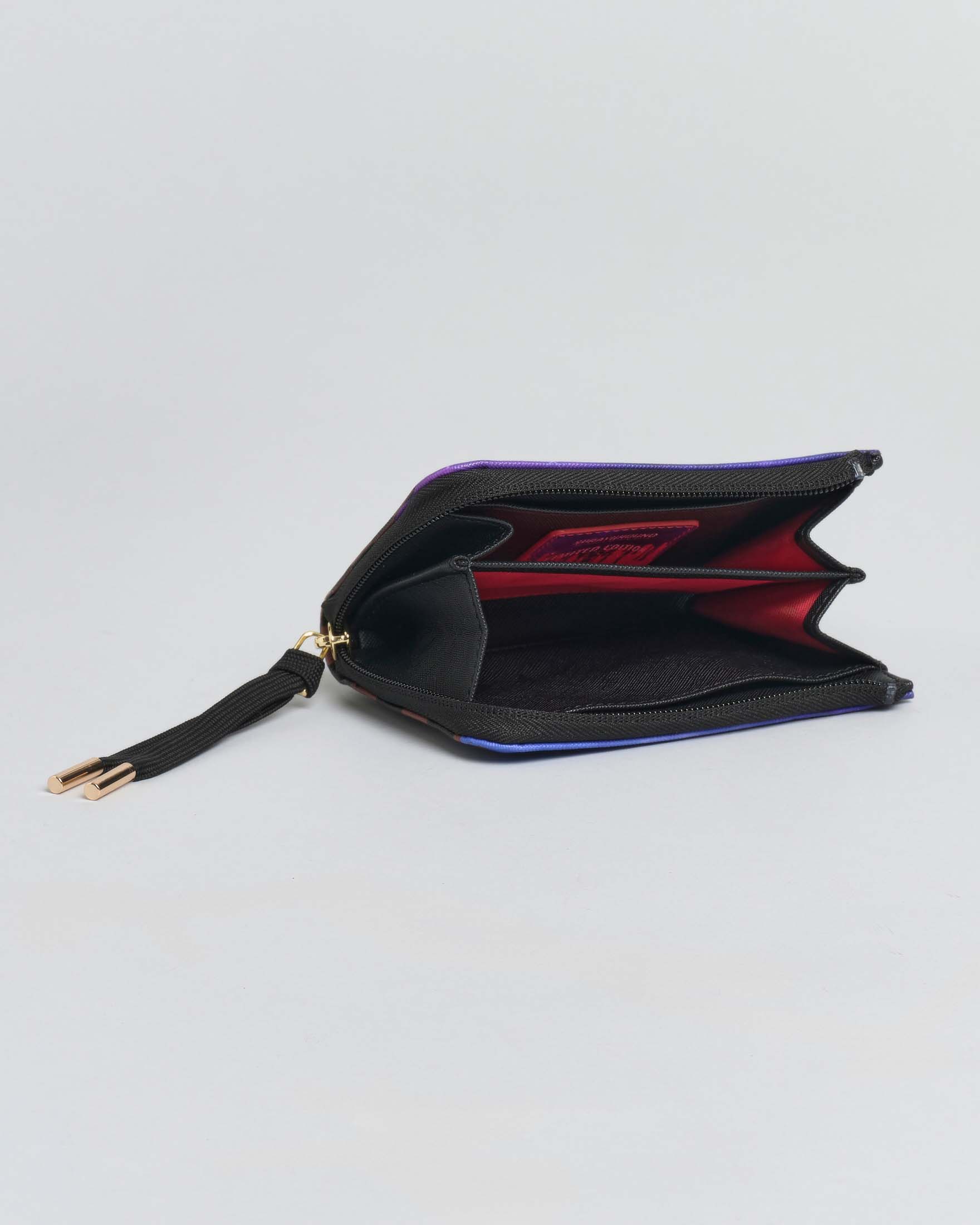 Portafoglio Sprayground checkered nero e marrone con effetto colato image