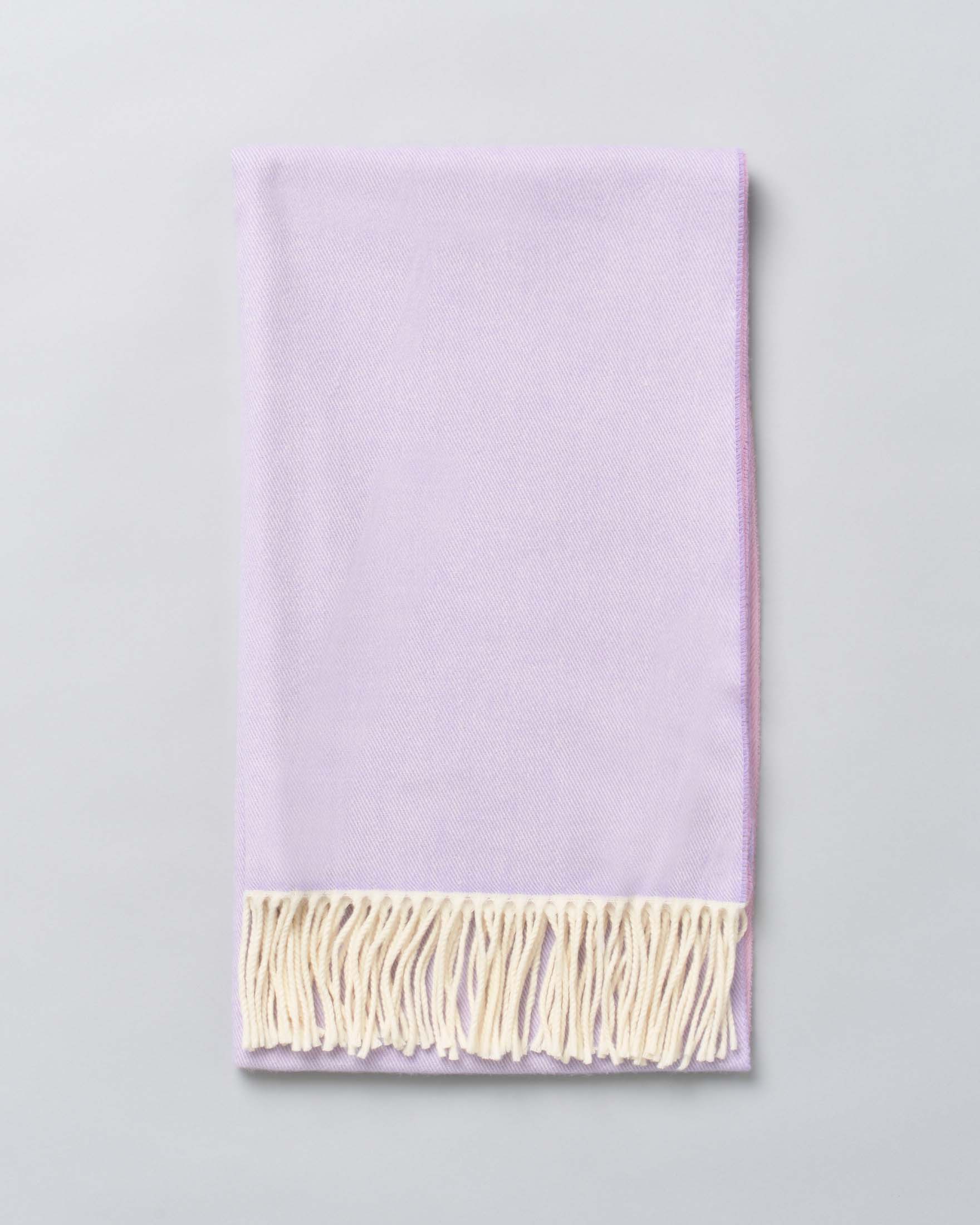 Sciarpa color lilla e rosa in misto cotone con frange applicate sul fondo