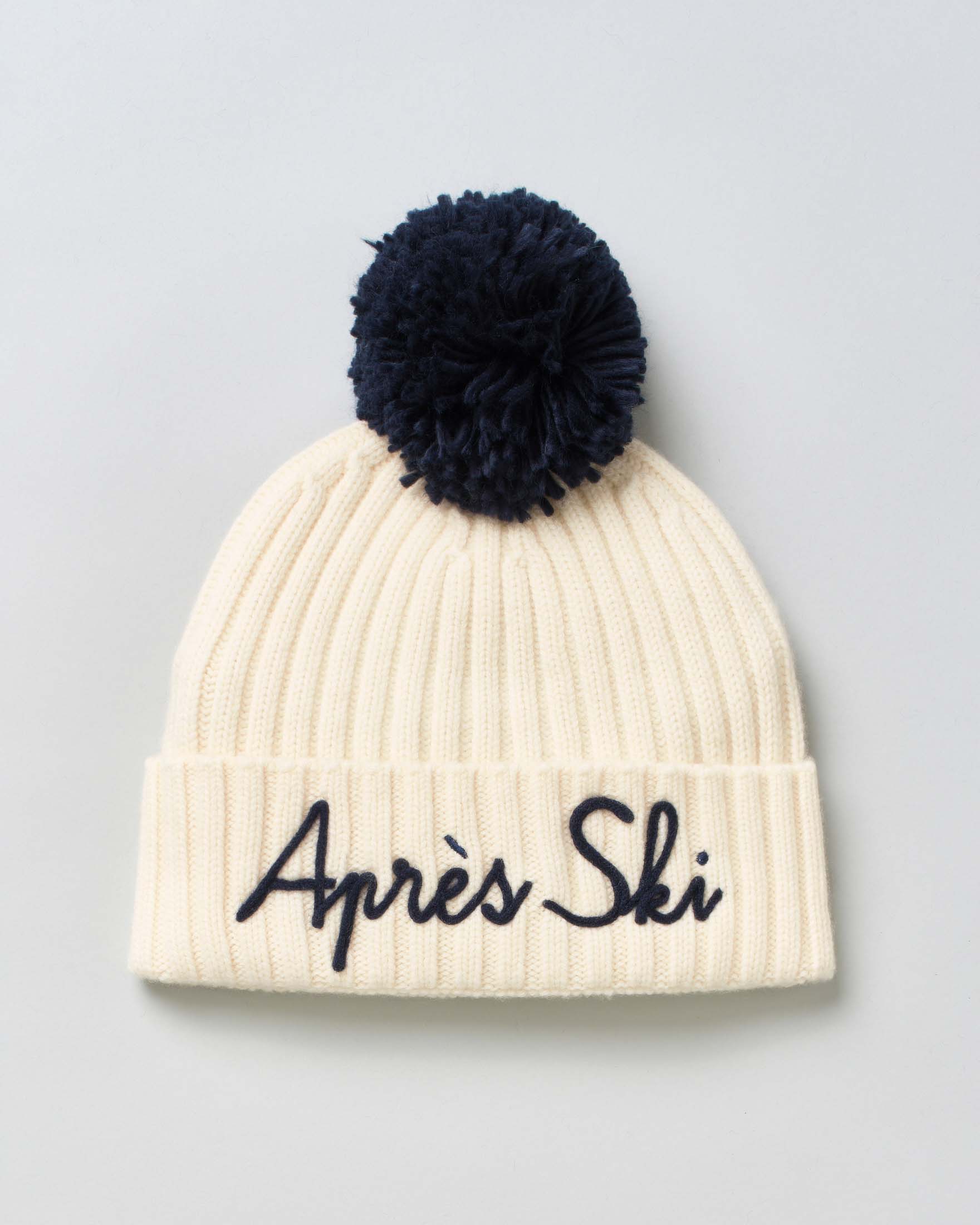 Berretto MC2 Saint Barth panna in maglia di lana e cachemire a coste inglesi con ricamo Après Ski e pompon blu
