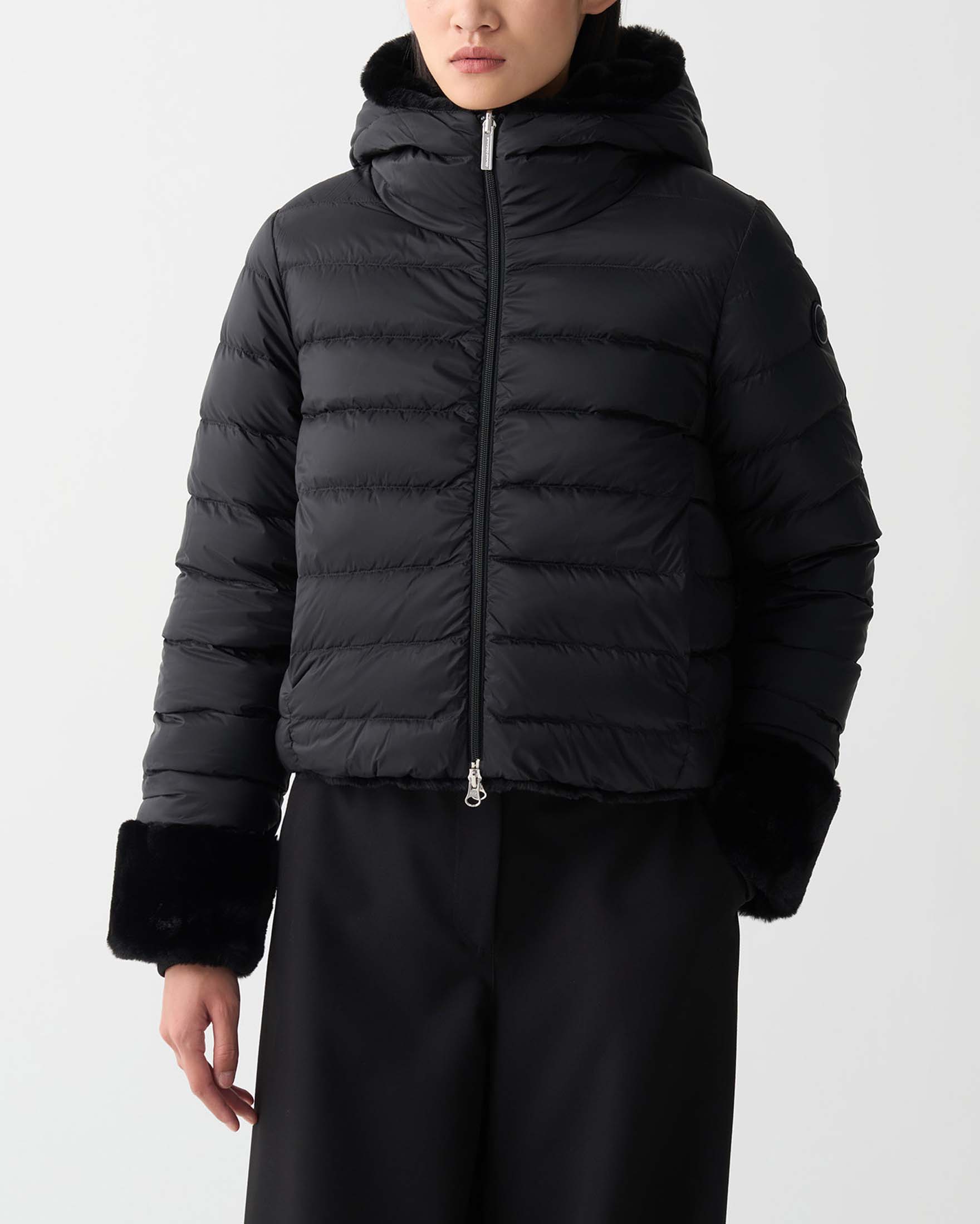 Ecopelliccia nera Colmar Originals reversibile nel tessuto trapuntato con cappuccio image