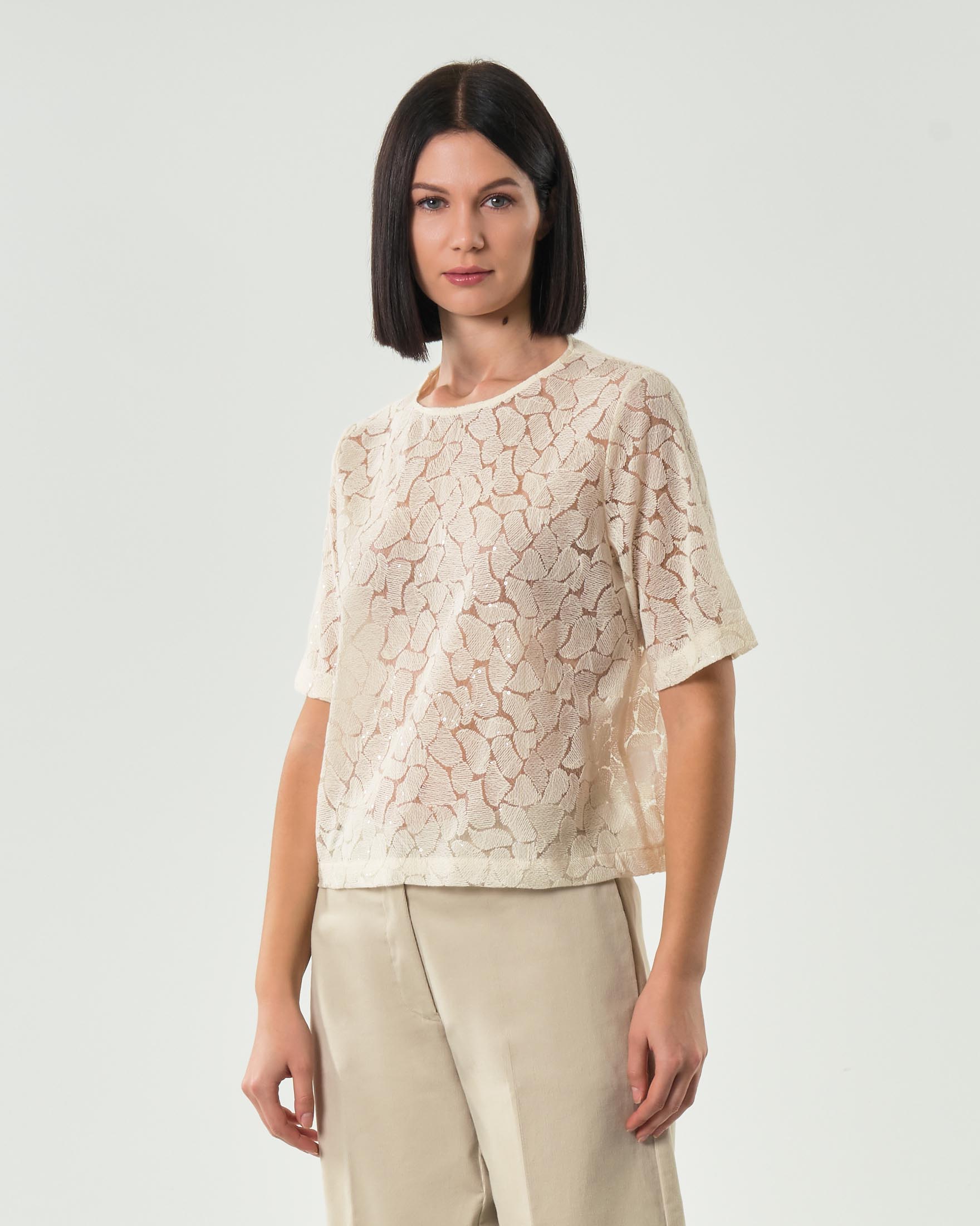 Blusa color avorio Hlo! in pizzo e paillettes con maniche corte