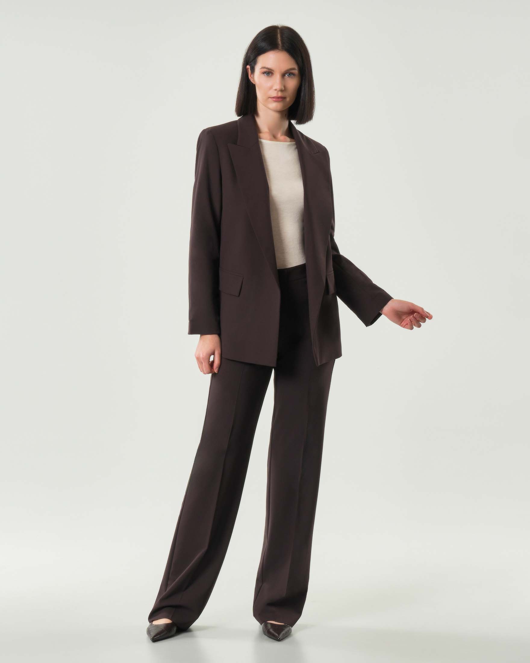 Pantaloni palazzo marroni in tela di misto lana stretch a vita bassa