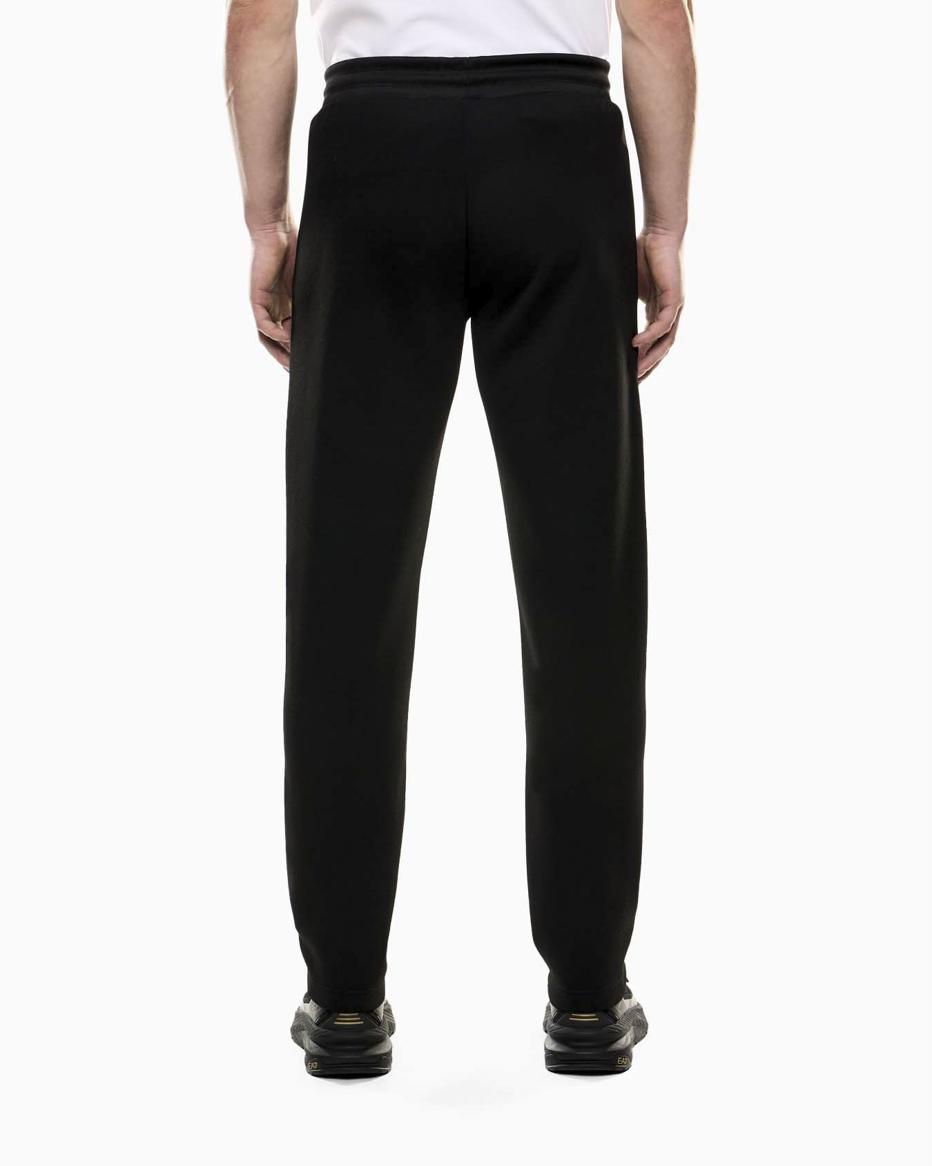 Pantaloni EA7 neri in misto viscosa con logo stampato e profili a contrasto image