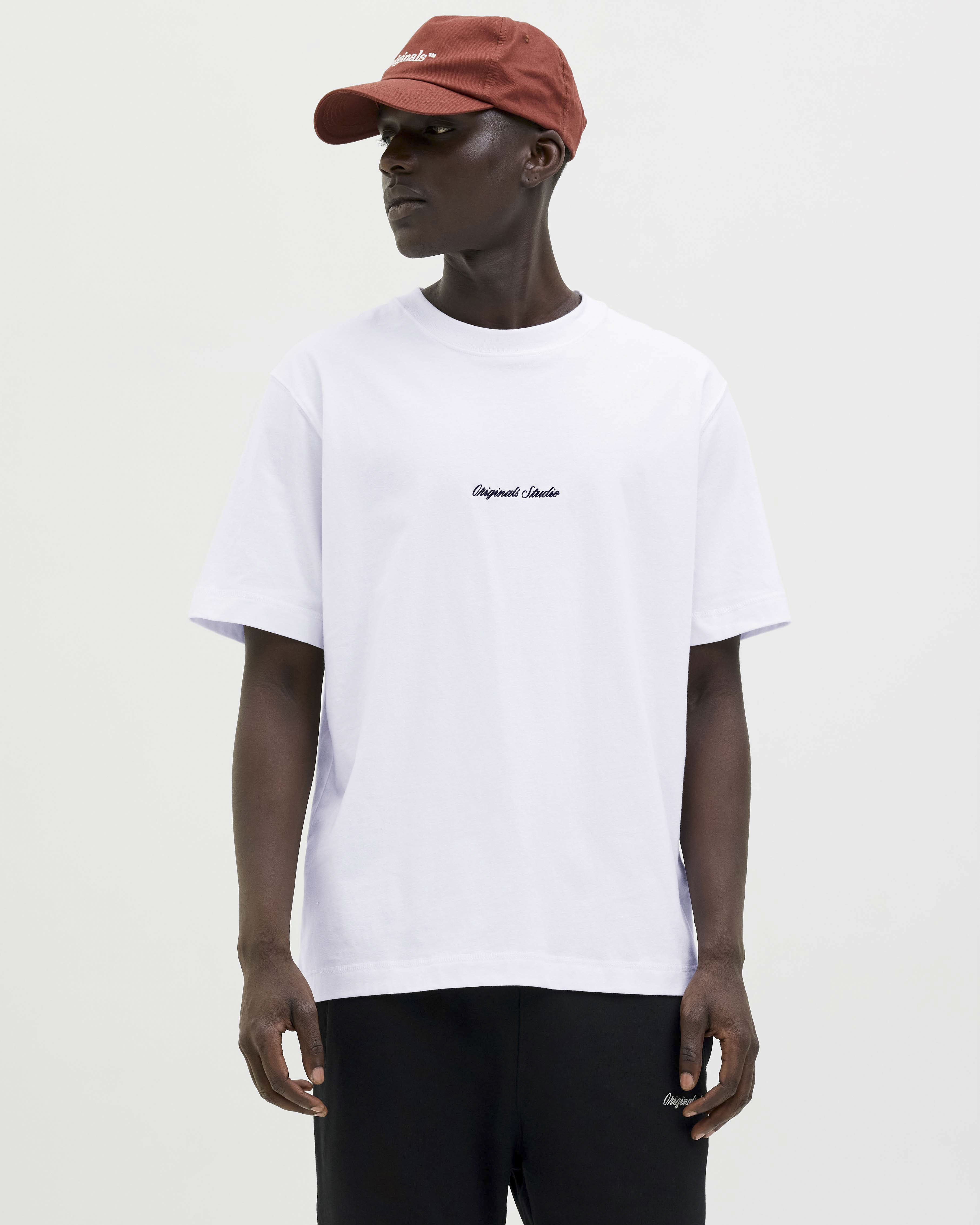 T-shirt bianca in cotone con logo ricamato sul petto