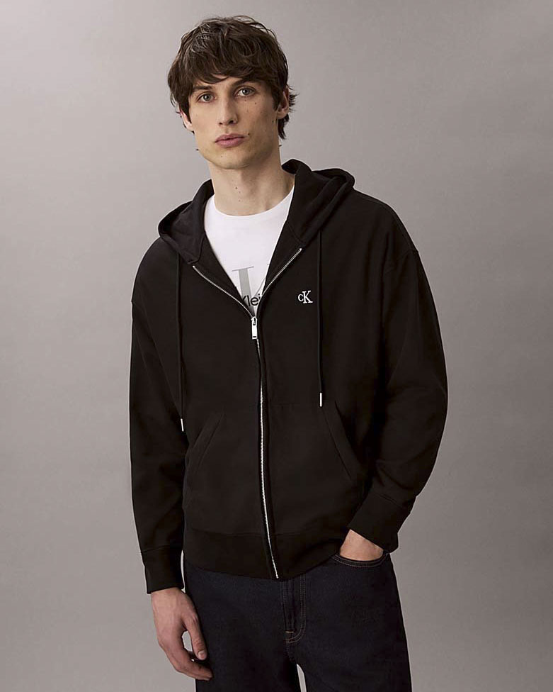 Felpa relaxed-fit Calvin Klein Jeans nera in cotone con cappuccio e chiusura zip image