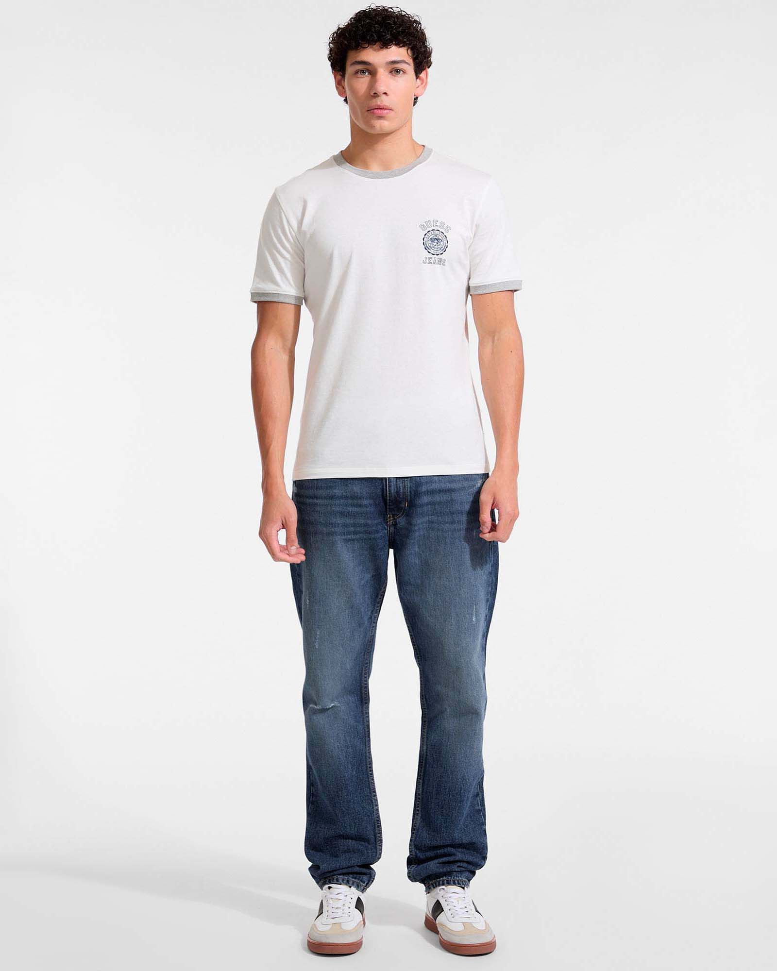 Guess Jeans slim-fit lavaggio scuro stone washed con abrasioni