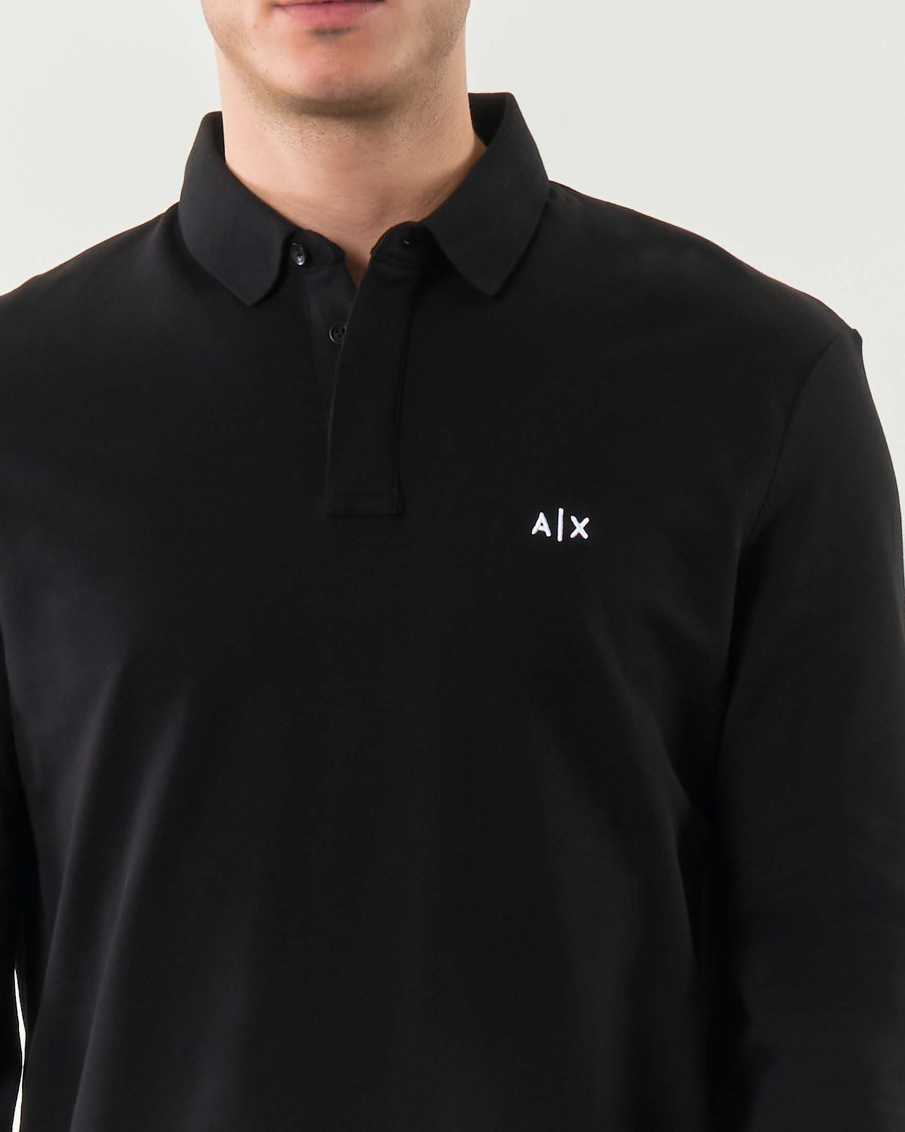 Polo manica lunga Armani Exchange nera in cotone stretch con logo AX sul petto image