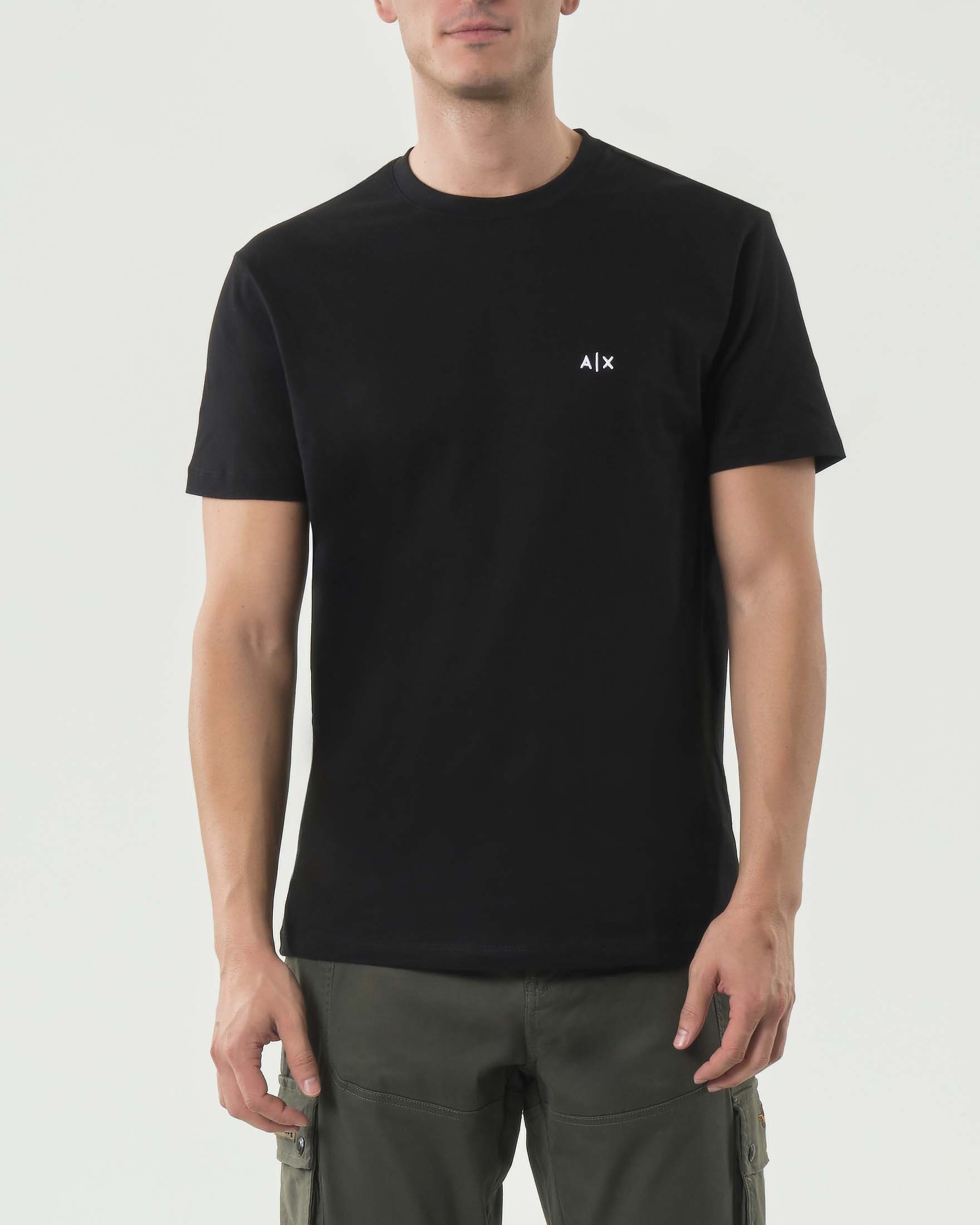 T-shirt Exchange nera in cotone con logo piccolo ricamato sul petto